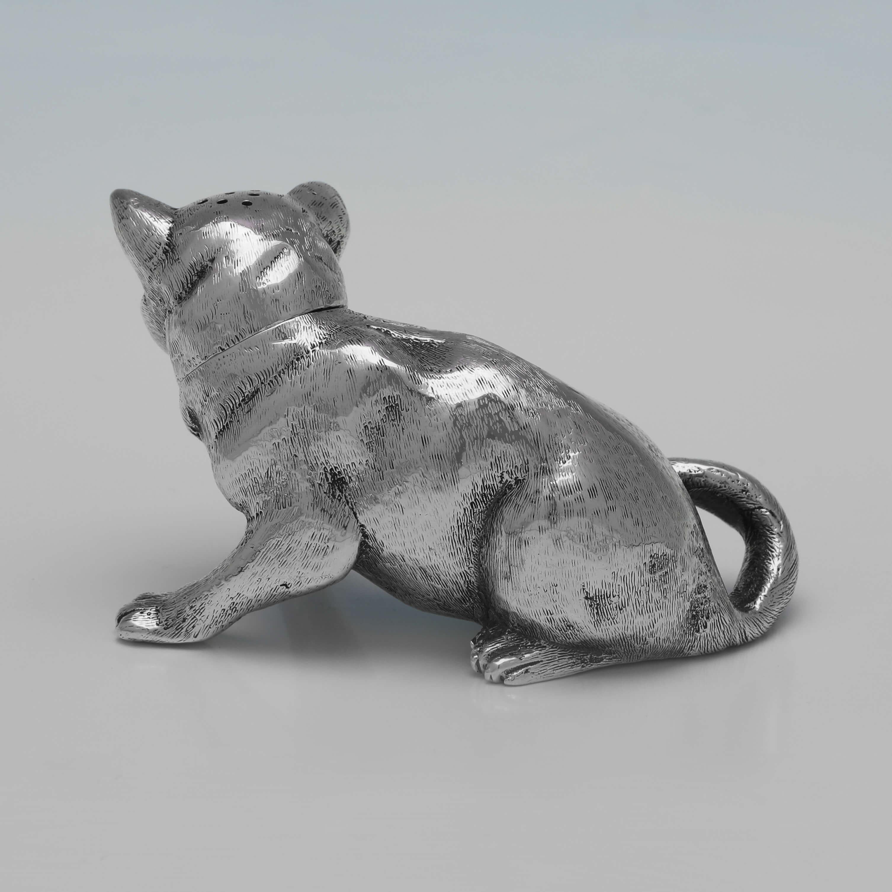 Hallmarked in London in 1880 by Jane Brownett, this very rare, Victorian, Antique Sterling Silver Cat Pepper Pot, is elegantly modelled, and realistically finished. The cat pepper pot measures 2.25