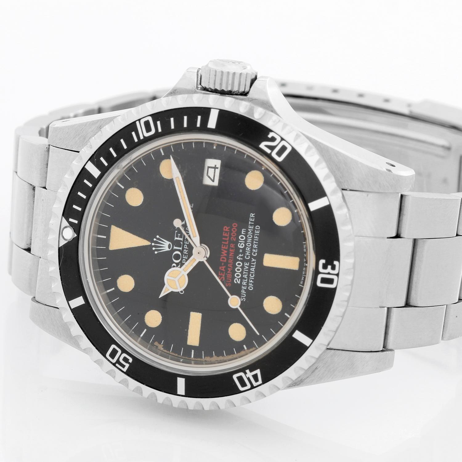 Rare Collectible Vintage Rolex Double Red DRSD Sea Dweller Men's Steel Watch 1665 - Automatic winding with date; acrylic crystal. Stainless steel case (40mm diameter). Case back signed on back; Rolex Oyster Original Gas Escape Value. Black dial with