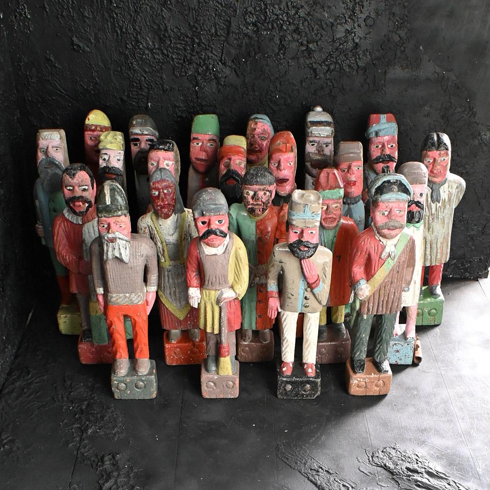 Rare Collection of Fairground Knockdown Hand Carved Figures 
 
A unique collection of 22 hand carved folk-art fairground (Jeu De Massacre) figures. This rare to market collection consists of an entire fairground stall collection and contains several