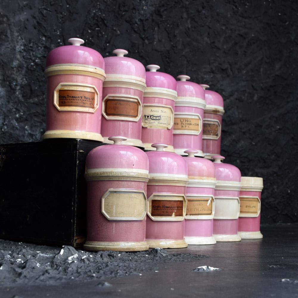 British Rare Collection of Puce Pink Ground Porcelain Apothecary Jars, circa 1880