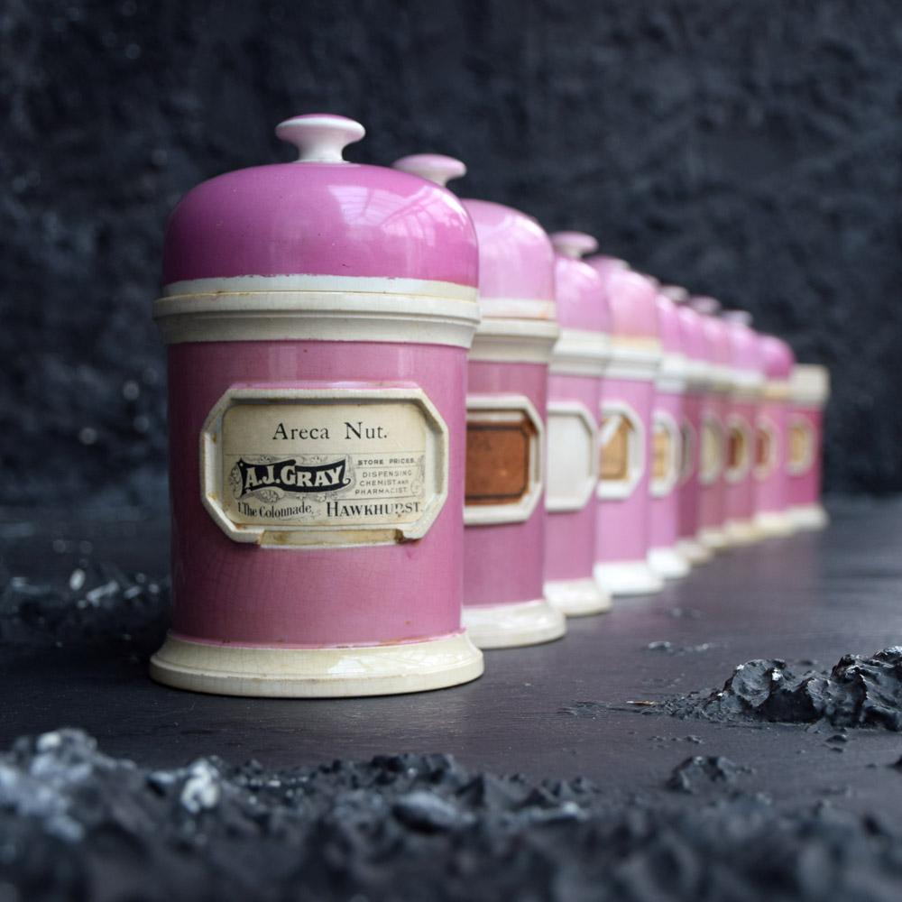 Rare collection of puce pink ground porcelain apothecary jars, circa 1880
we are proud to offer a rare collection of puce pink ground porcelain apothecary jars. With original handwritten labels marked from 1910-1920 but these jars are earlier in