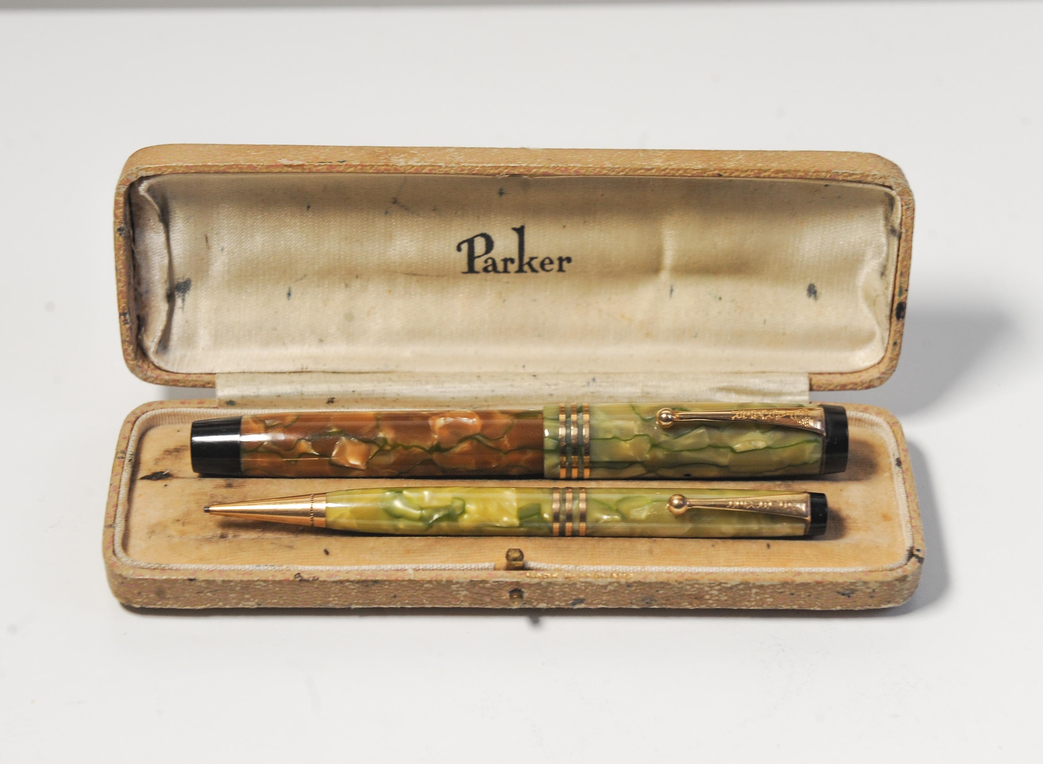 1930's Art Deco Parker Duofold Marbleised Fountain Pen & Pencil Set in Original Parker Box - rare collectors item.

Fountain Pen Made in Canada 14k nib 
Geo S. Parker PAT SEP. 5-16

Pencil Made in USA 14k nib 
Geo S. Parker PAT SEP. 5-16