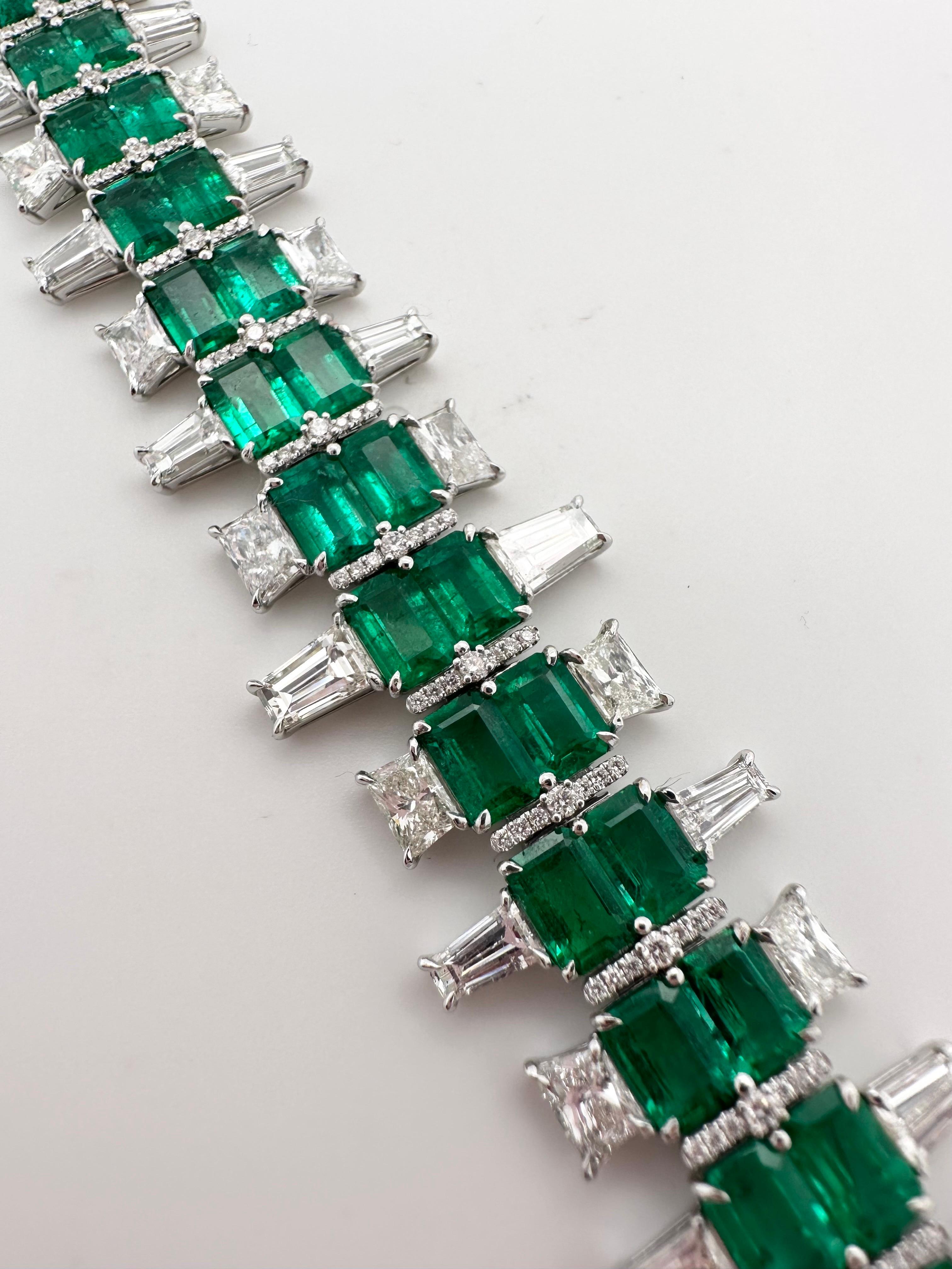 Rare matching emerald and diamond bracelet in 18KT whte gold. The bracelet is made in Art Deco style, creator is known. The matching emeralds are Colombian origin and are a beautiful bluish green color, the bracelet is made with a rare exquisite