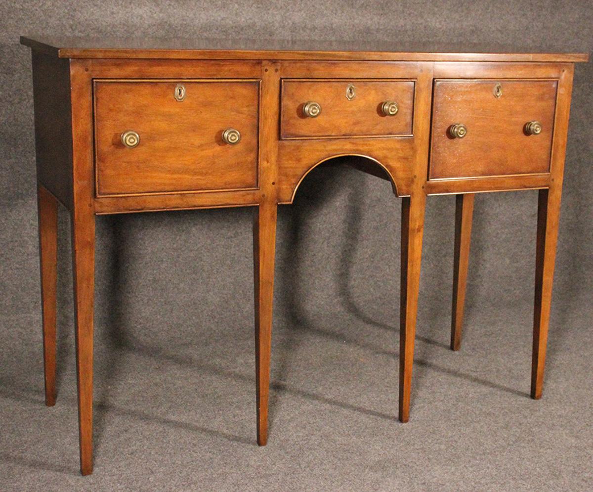 Beautiful condition. Simple and yet so traditional CW model of sideboard circa 1950. Measures 57 wide x 40 3/4 tall x 20 deep.