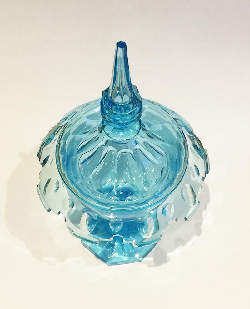 Dutch Azure Blue Crystal Cut Ginger Coupe, 19th Century

Crystal Ginger coupe. A lidded bowl raised on a base of Dutch crystal cut in very rare color blue
Age 1840-1860, Netherlands
The measurements for the coupe is 33 cm high and 17 cm diagonal.