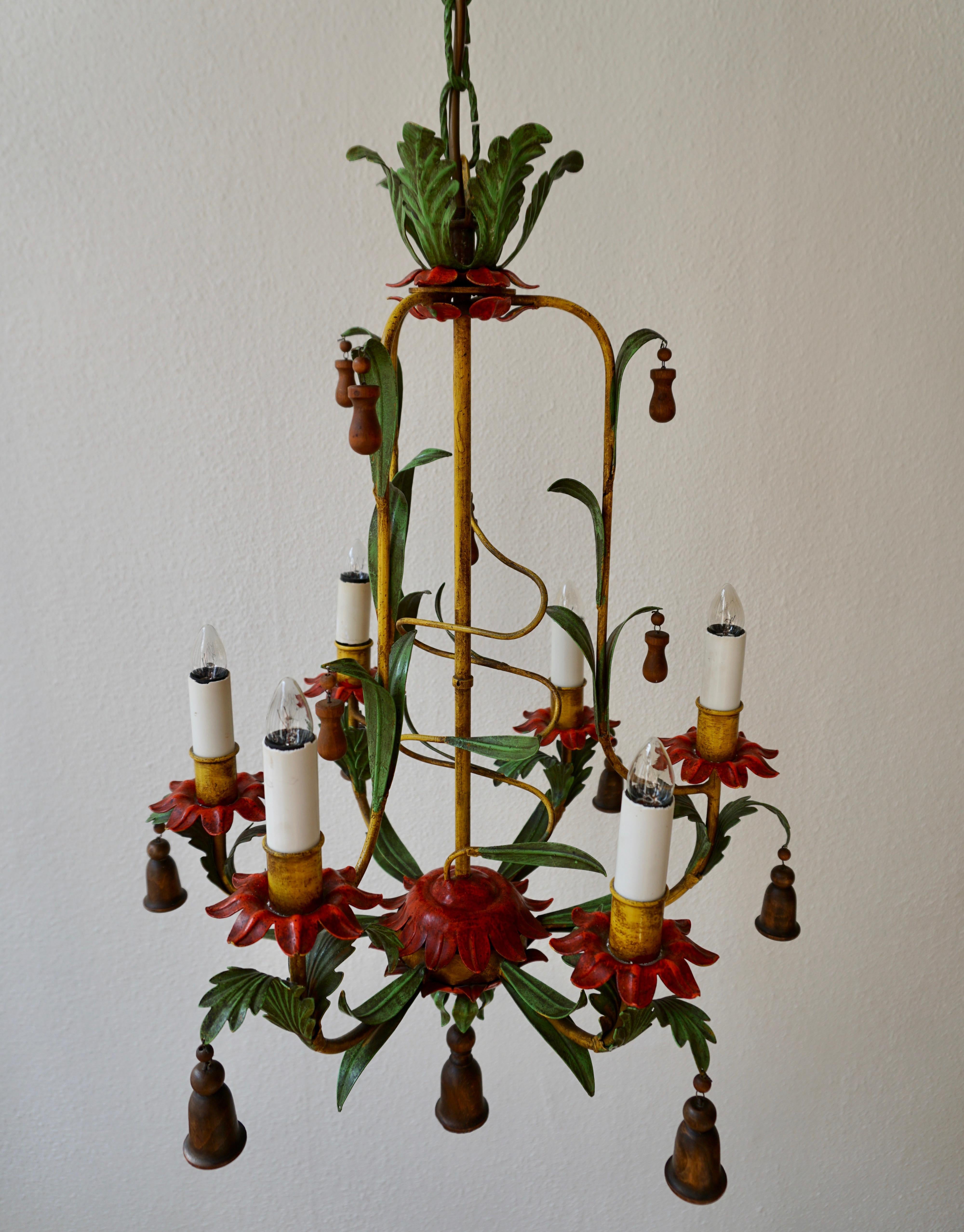 Beautiful iron painted chandelier with wooden bells.
Dimension: Diameter 48 cm.
Height fixture 65 cm.
Total height with chain 110 cm.
Six E14 bulbs.