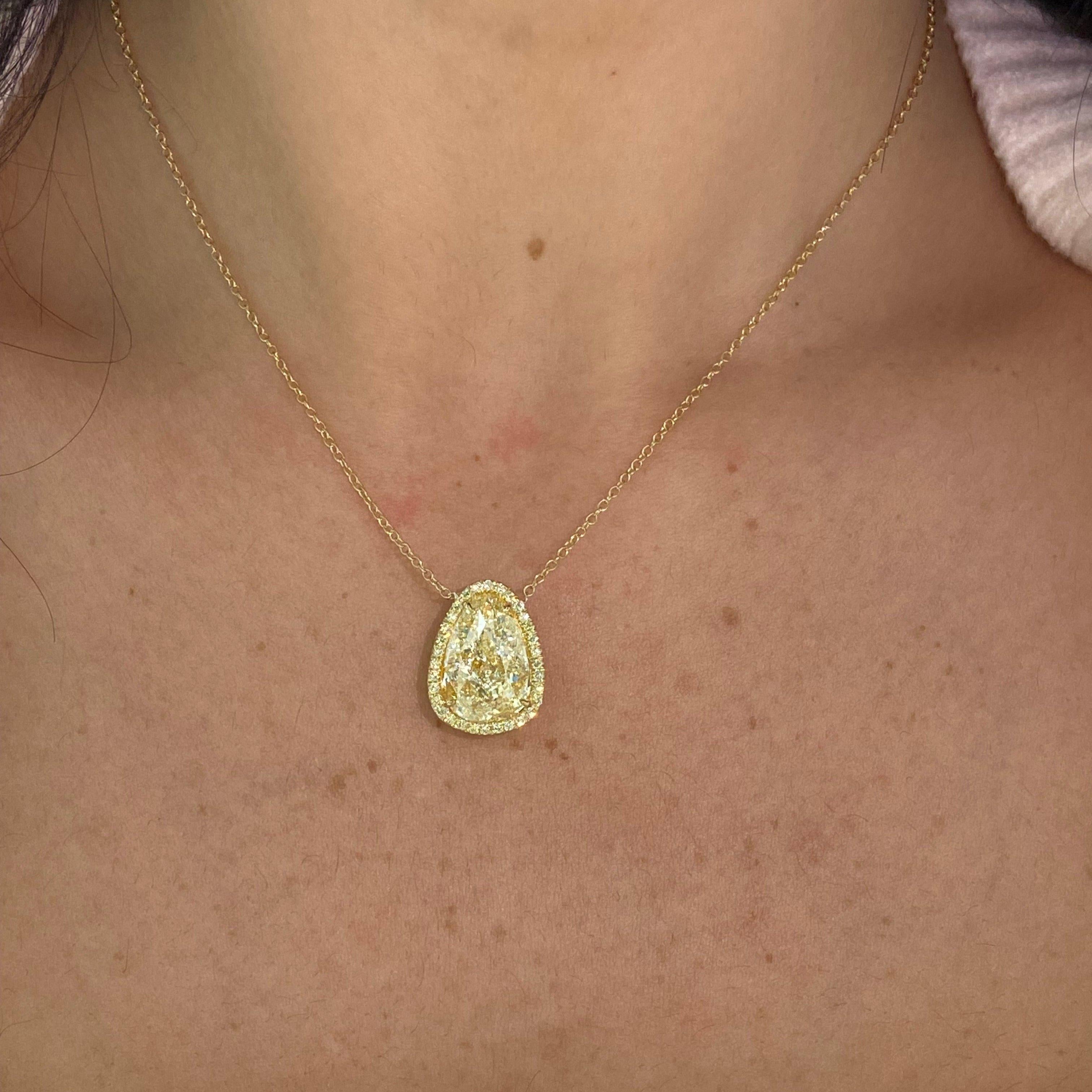This uniquely cut 10ct yellow diamond necklace is a stunning piece that instantly elevates any outfit. Handcrafted by our master jeweler, every diamond is expertly cut, set to maximize its sparkle and brilliance. It's a symbol of sophistication,