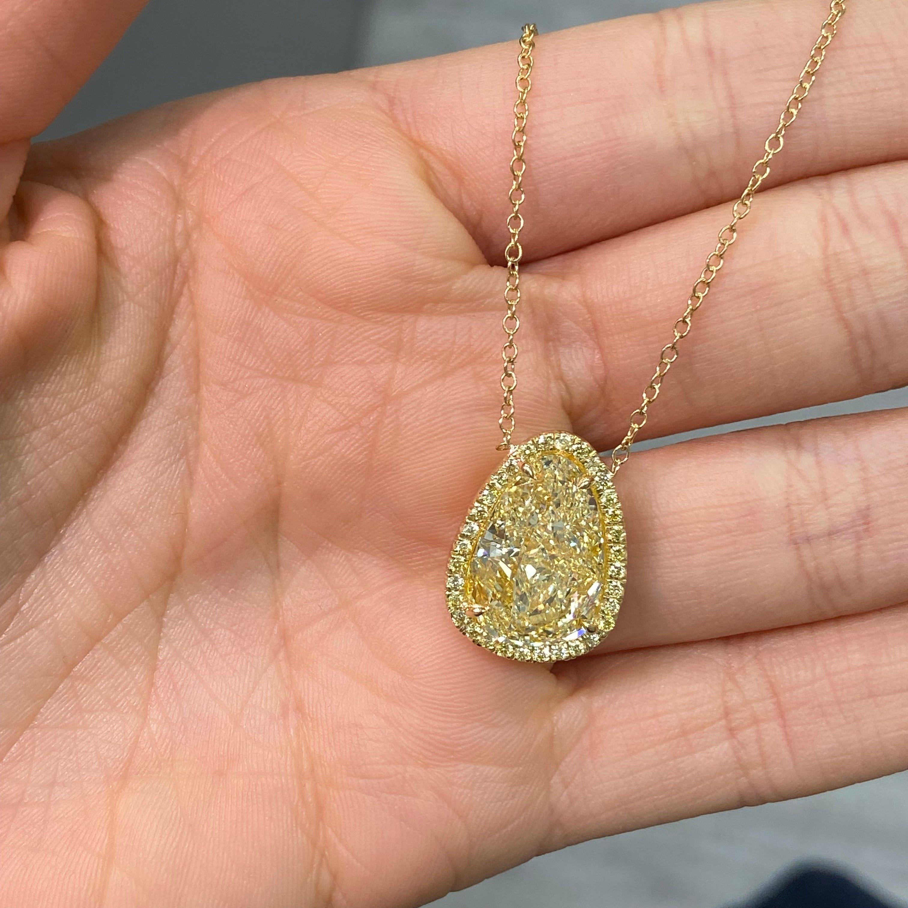 Modern Rare Colors- 10 Carat Light Yellow Diamond Pear Shape Halo Pendant For Sale