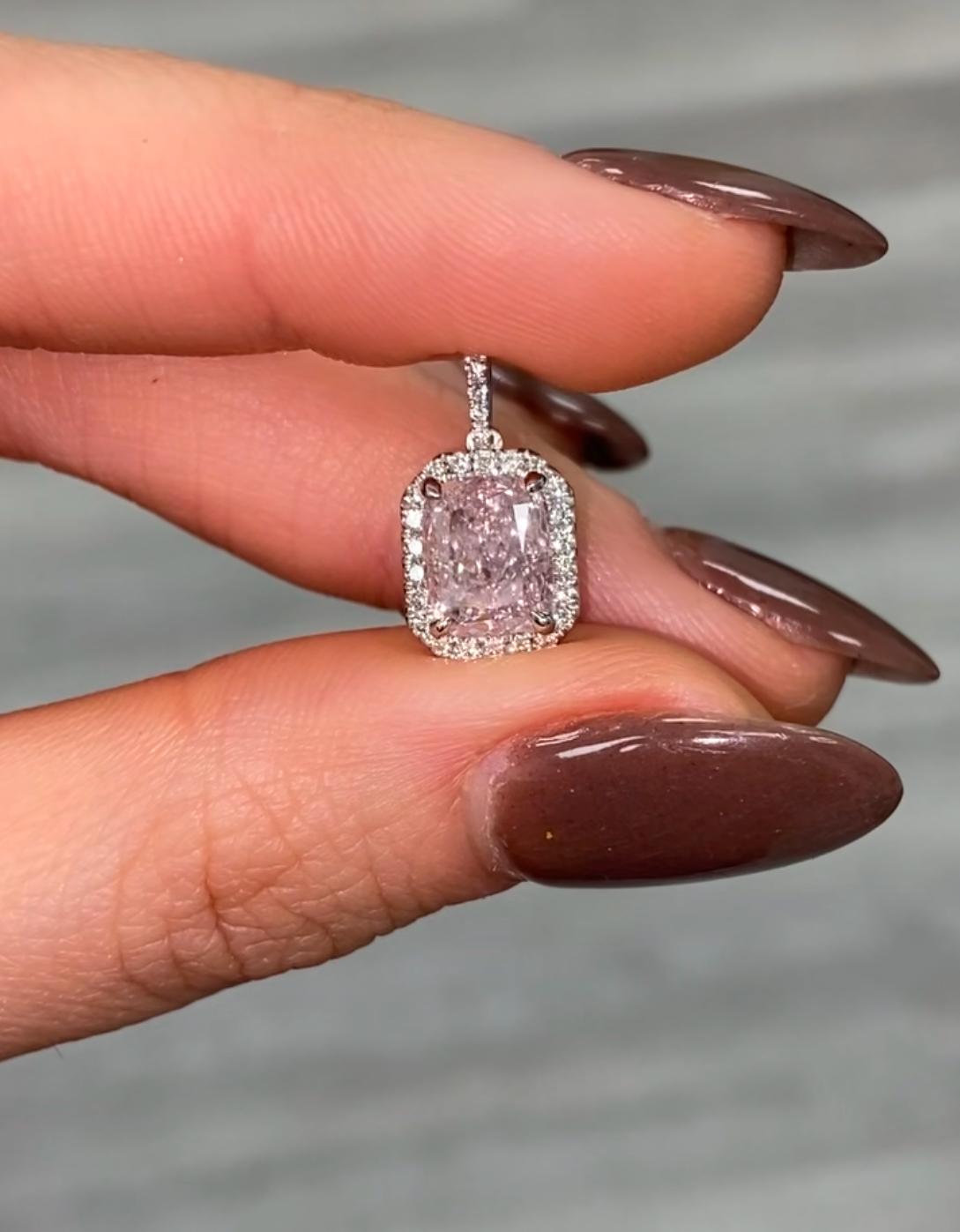 This pink diamond necklace is a stunning piece that adds rarity to any collection. Handcrafted by our master jeweler, every diamond is expertly cut, set to maximize its sparkle and brilliance. It's a symbol of sophistication, style, and luxury that