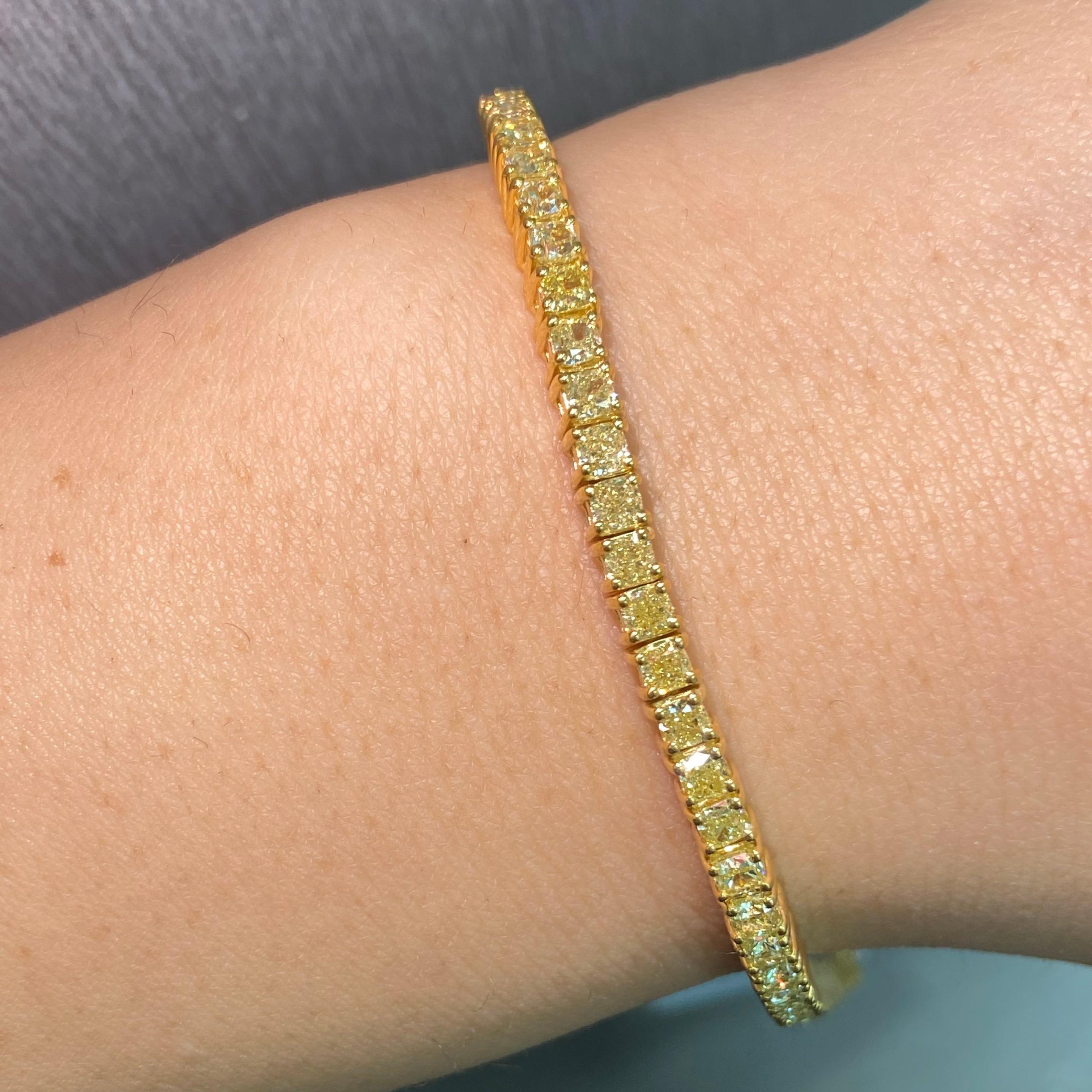 Wrap your wrist in pure brilliance with this stunning yellow diamond tennis bracelet. Featuring 7.43 carats of natural fancy yellow diamonds, this exquisite piece brings together radiant color and timeless design for an effortlessly elegant look.

A