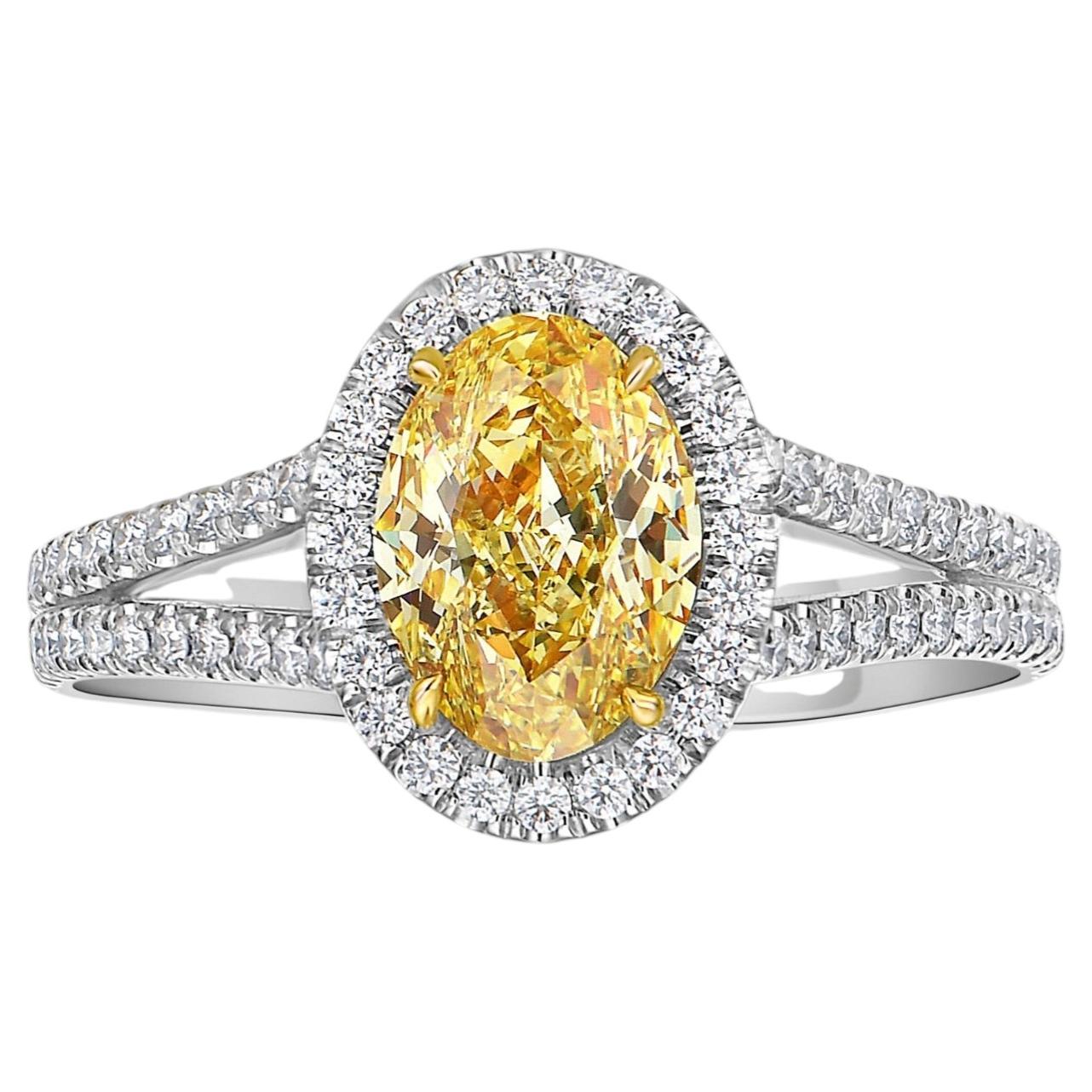 1.4 Carat Fancy Intense Yellow Oval Cut Diamond Halo Split Shank Engagement Ring For Sale