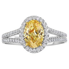 1.4 Carat Fancy Intense Yellow Oval Cut Diamond Halo Split Shank Engagement Ring