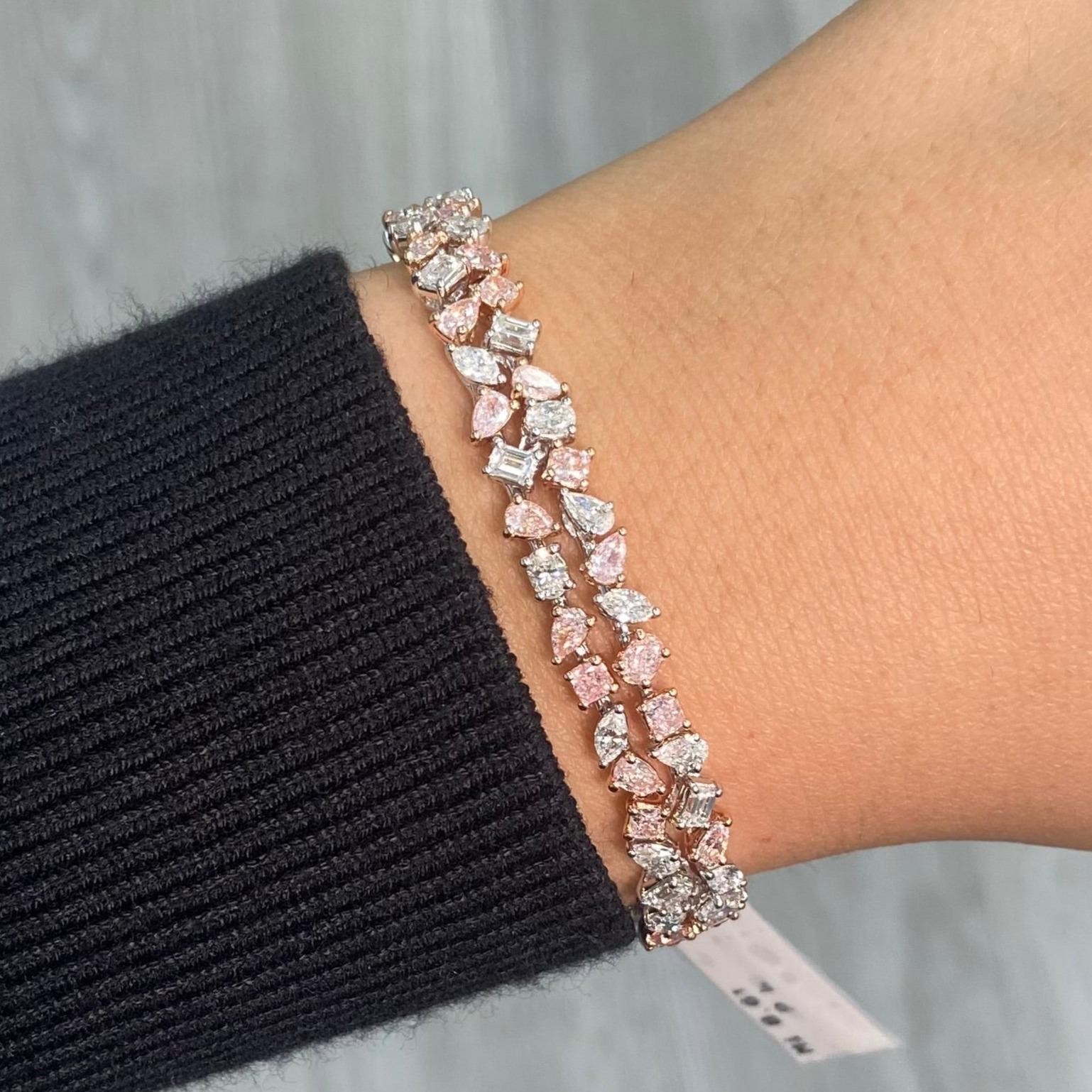 Very elegant bracelet featuring all natural pink and white diamonds 
Made in 18K White Gold. 
High quality fancy pink diamonds and E-F color white diamonds
VS-SI clarity
8 carat total diamonds. 
At Rare Colors, you can experience the elegance of our