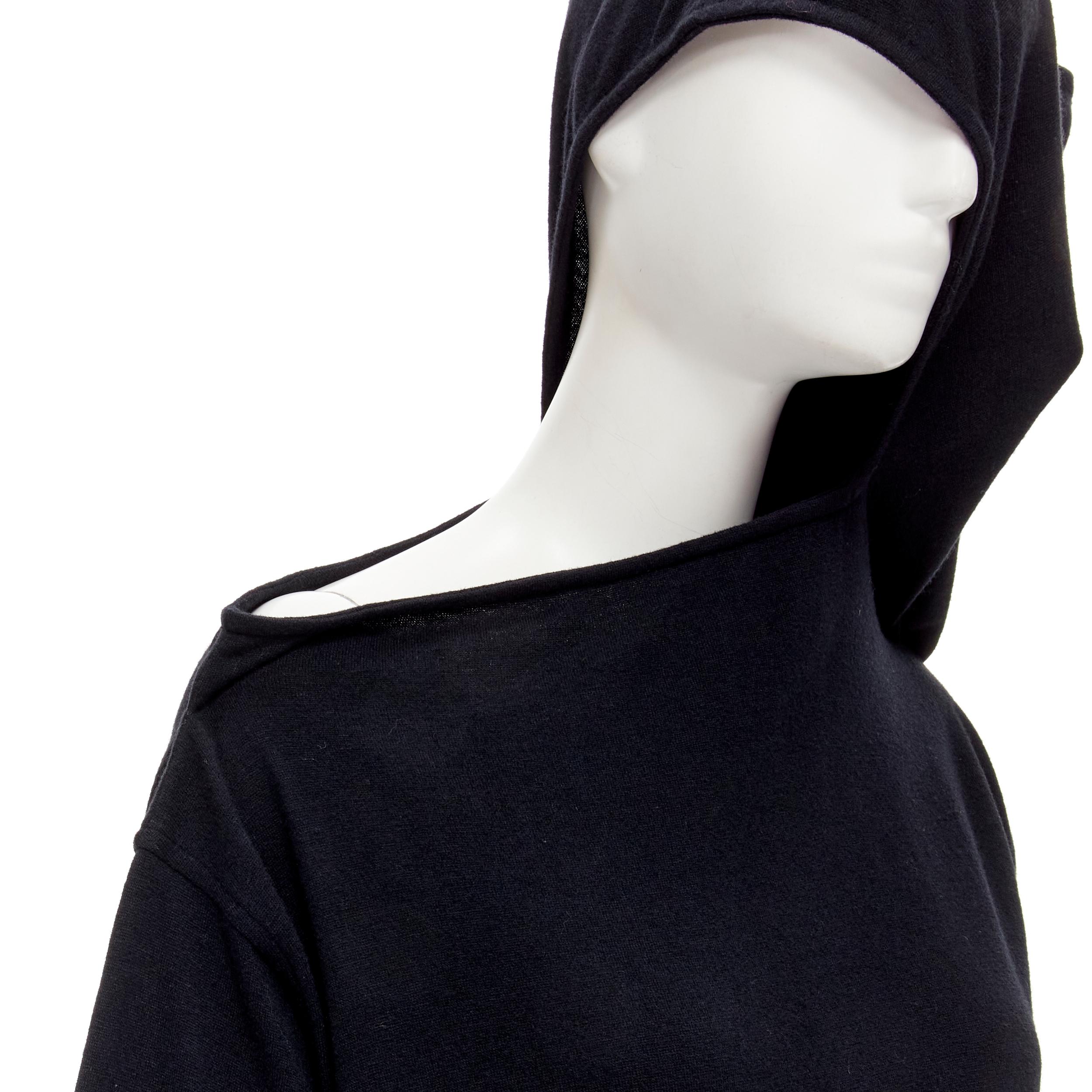 rare COMME DES GARCONS 1980's Vintage black asymmetric neckline hooded dress M 
Reference: CRTI/A00700 
Brand: Comme Des Garcons 
Designer: Rei Kawakubo 
Material: Feels like wool 
Color: Black 
Pattern: Solid 
Closure: Tie 
Extra Detail: Asymmetric