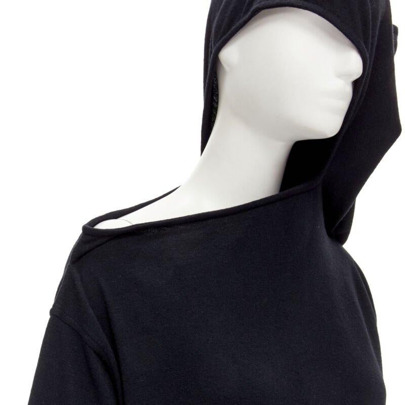 rare COMME DES GARCONS 1980's Vintage black asymmetric neckline hooded dress M
Reference: CRTI/A00700
Brand: Comme Des Garcons
Designer: Rei Kawakubo
Material: Feels like wool
Color: Black
Pattern: Solid
Closure: Self Tie
Extra Details: Asymmetric