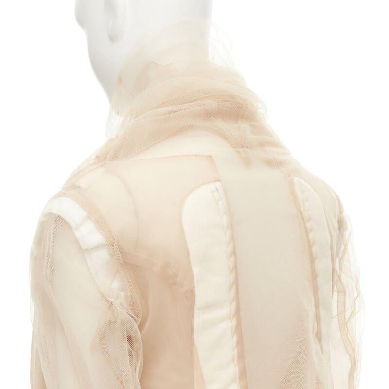 rare COMME DES GARCONS 2009 Runway nude deconstructed inside out tulle jacket XS
Reference: CRTI/A00743
Brand: Comme Des Garcons
Designer: Rei Kawakubo
Collection: 2009 - Runway
Material: Nylon
Color: Nude, White
Pattern: Solid
Lining:  Fabric
Extra