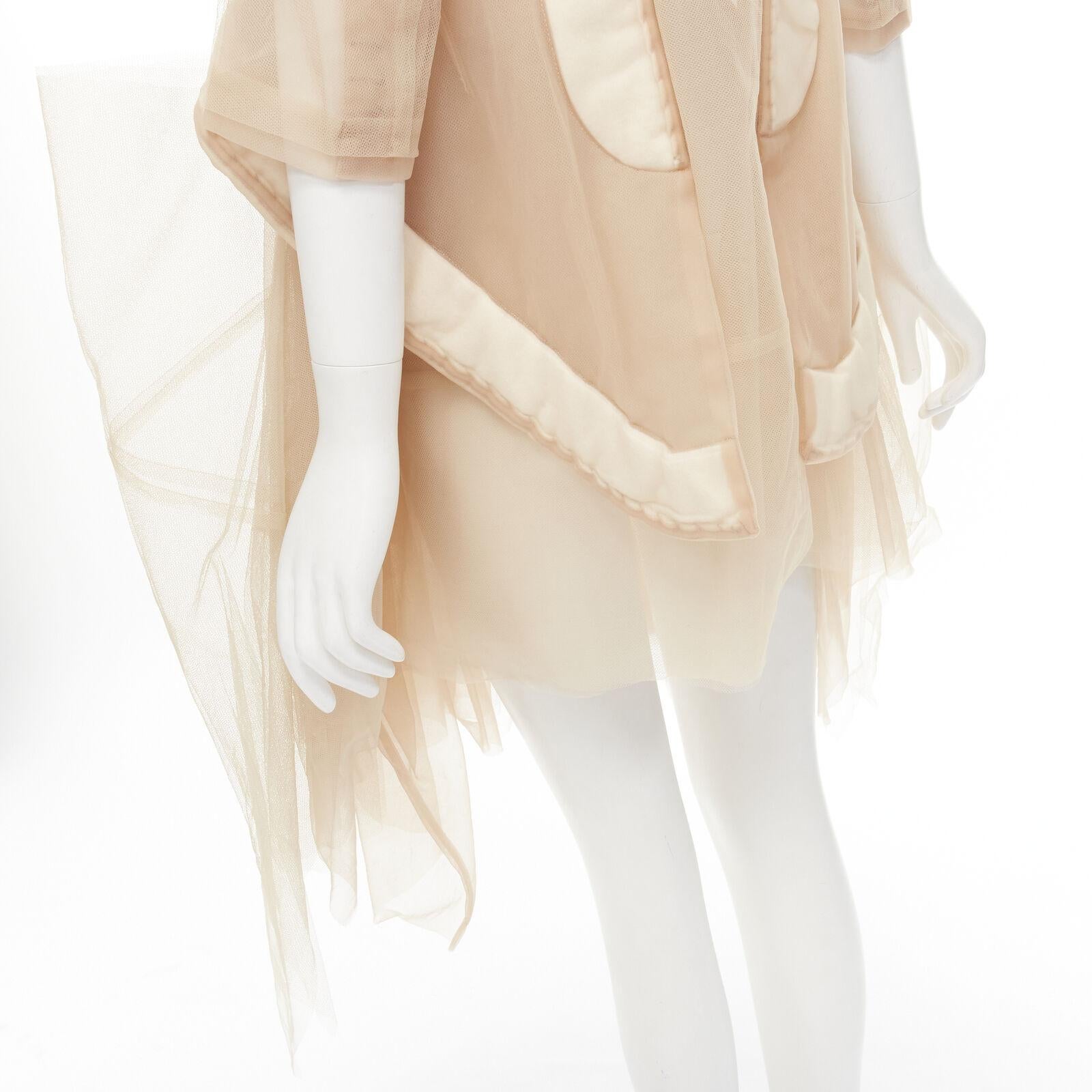 rare COMME DES GARCONS 2009 Runway nude inside out sheer tulle long jacket XS
Reference: CRTI/A00744
Brand: Comme Des Garcons
Designer: Rei Kawakubo
Collection: 2009 - Runway
Material: Nylon
Color: Nude, White
Pattern: Solid
Closure: Button
Lining: