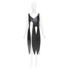 rare COMME DES GARCONS 2019 black textured cowhide leather fringed petal top XS