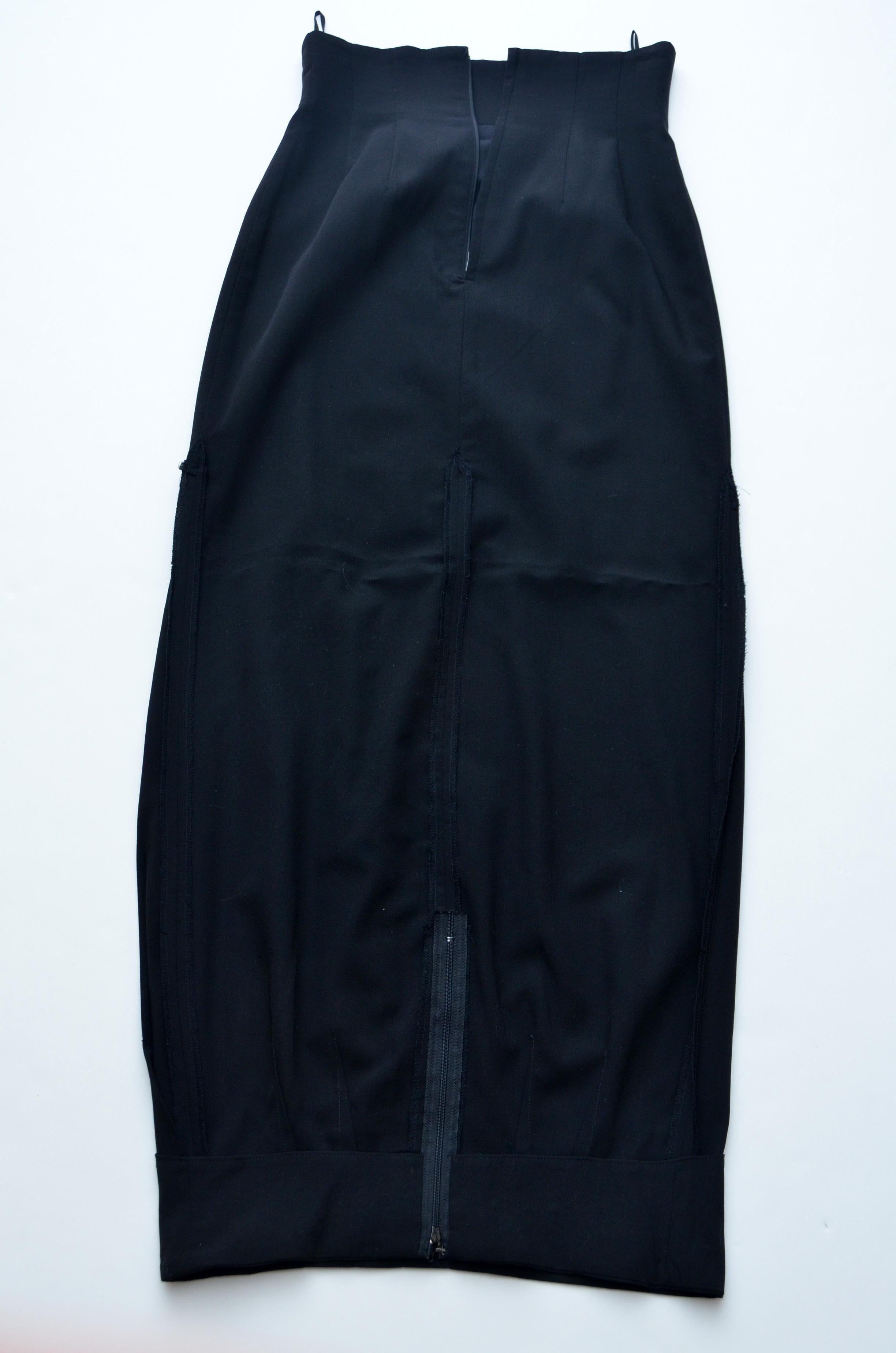 Rare Comme Des Garçons AD1990 Upside Down Long Black Skirt  
Top half of the skirt is lined and bottom in not.
Bottom and top have zipper.Top of the skirt has finished edges and bottom of has it unfinished.
Very unusual design  from Rei K early