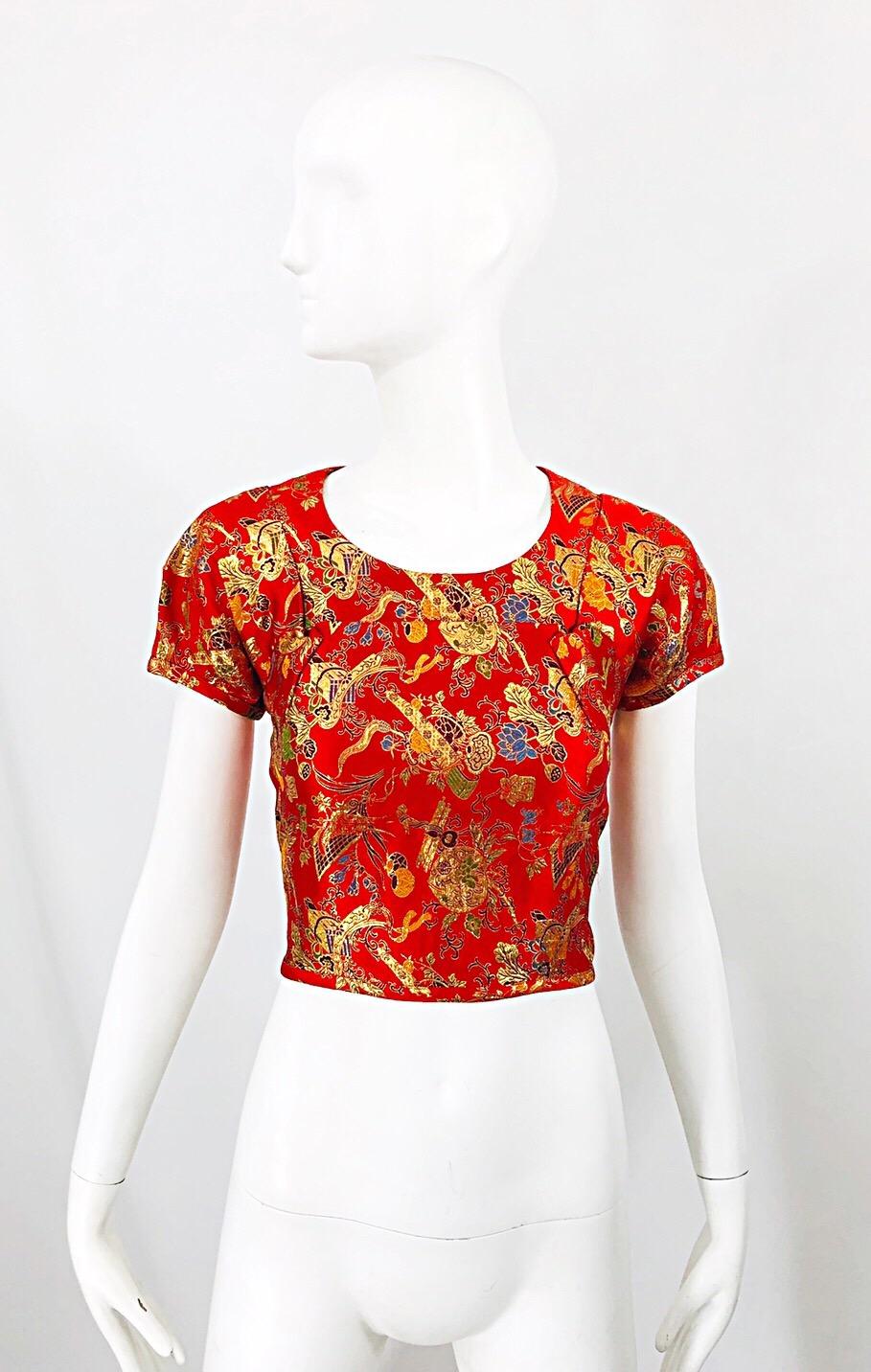 Rare 1990s vintage COMME DES GARCONS / JUNYA WATANABE Asian themed lipstick red crop top! Features vibrant colors of blue, gold, orange, green, red purple and black throughout. Stylish origami like sleeves fold in the back. Hidden zipper down the