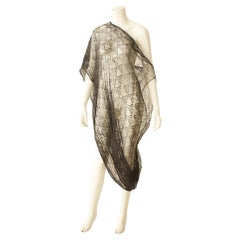Raro vestido de encaje diáfano negro de Comme des Garçons En el Met Costume Institute