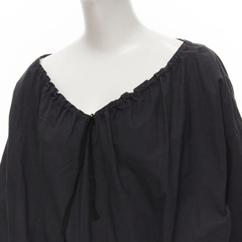 rare COMME DES GARCONS Vintage 1980's Beggar Look washed cotton bishop dress
Reference: CRTI/A00690
Brand: Comme Des Garcons
Designer: Rei Kawakubo
Collection: 1980s
Material: Feels like cotton
Color: Grey
Pattern: Solid
Closure: