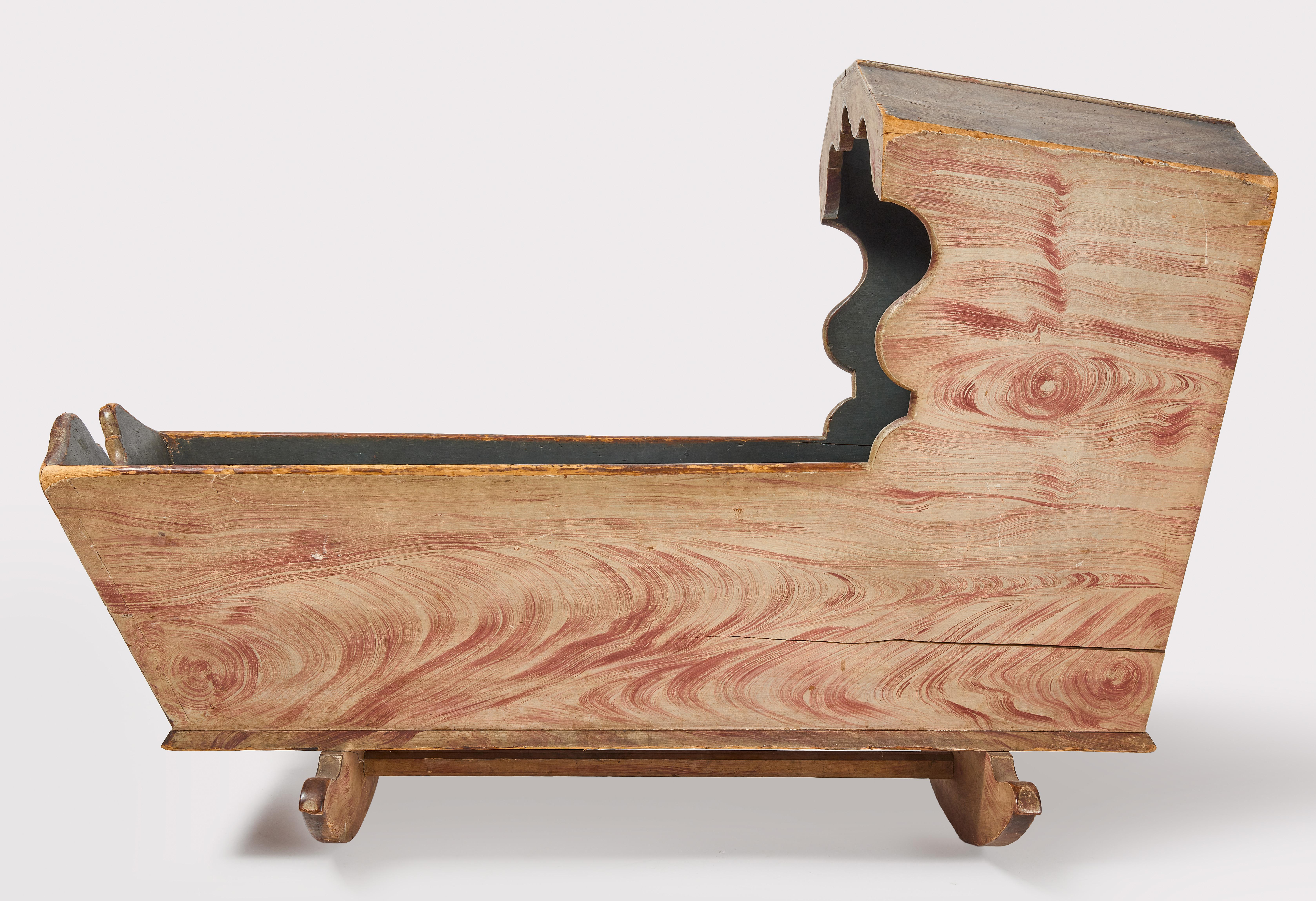 Rare paint-Decorated Queen Anne painted-decorated baby cradle. American, circa 1760. Original 18th century paint-decoration with original blue interior. Condition: Exceptional original condition. H 30-1/4