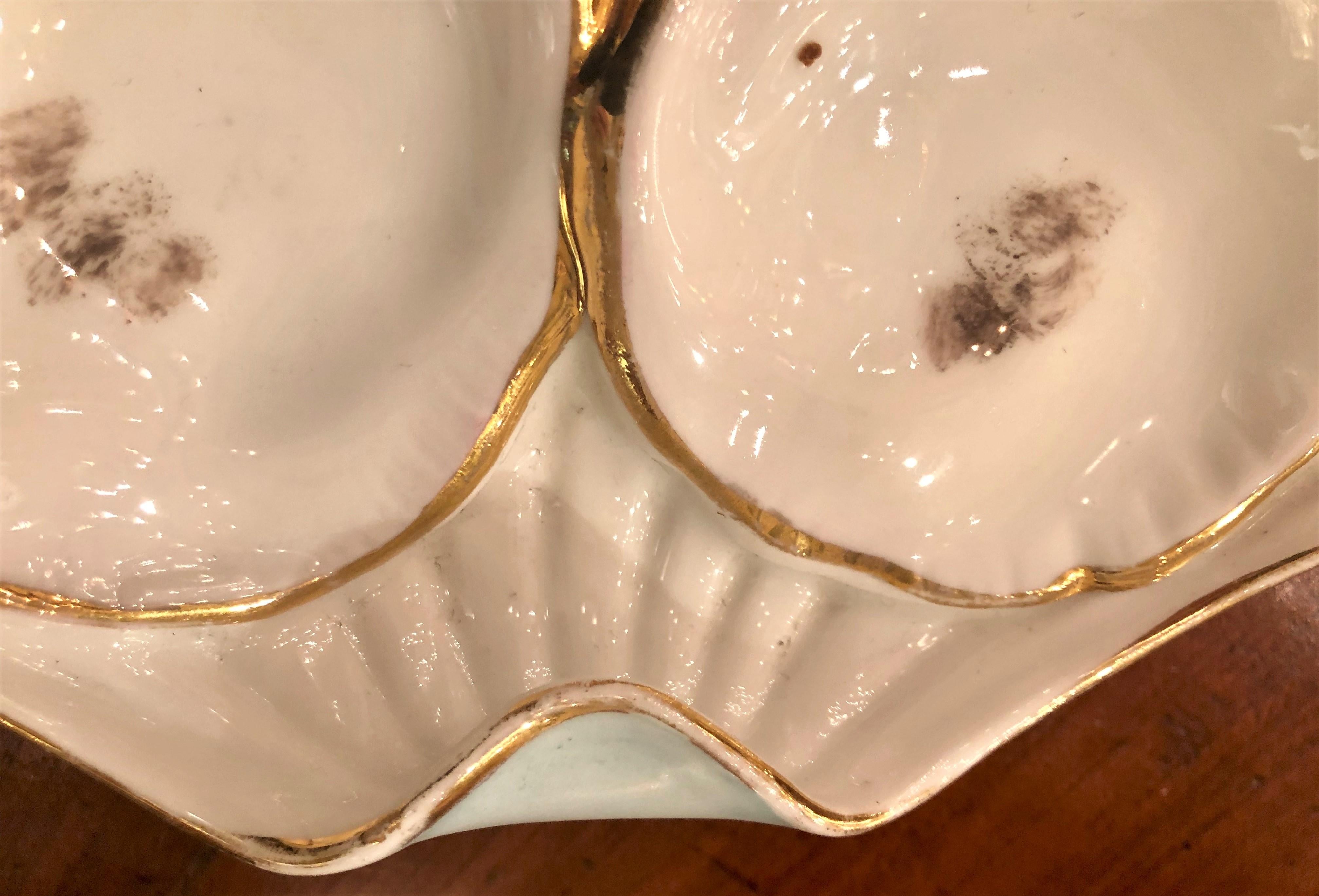 Rare Continental shaped porcelain oyster plate, hand painted, circa 1880.