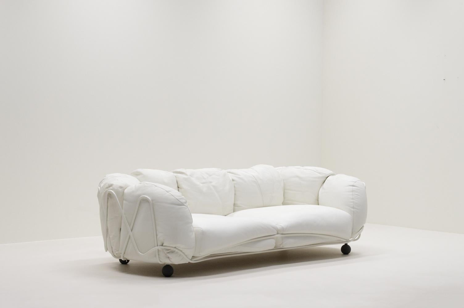 Rare Corbeille lounge sofa by Francesco Binfaré for Edra, Italy. 3 seater sofa with a white basketshaped woven metal structure and filled with white leather, informal, loosely covered cushions. Hand made and high quality leater. The seat cushions