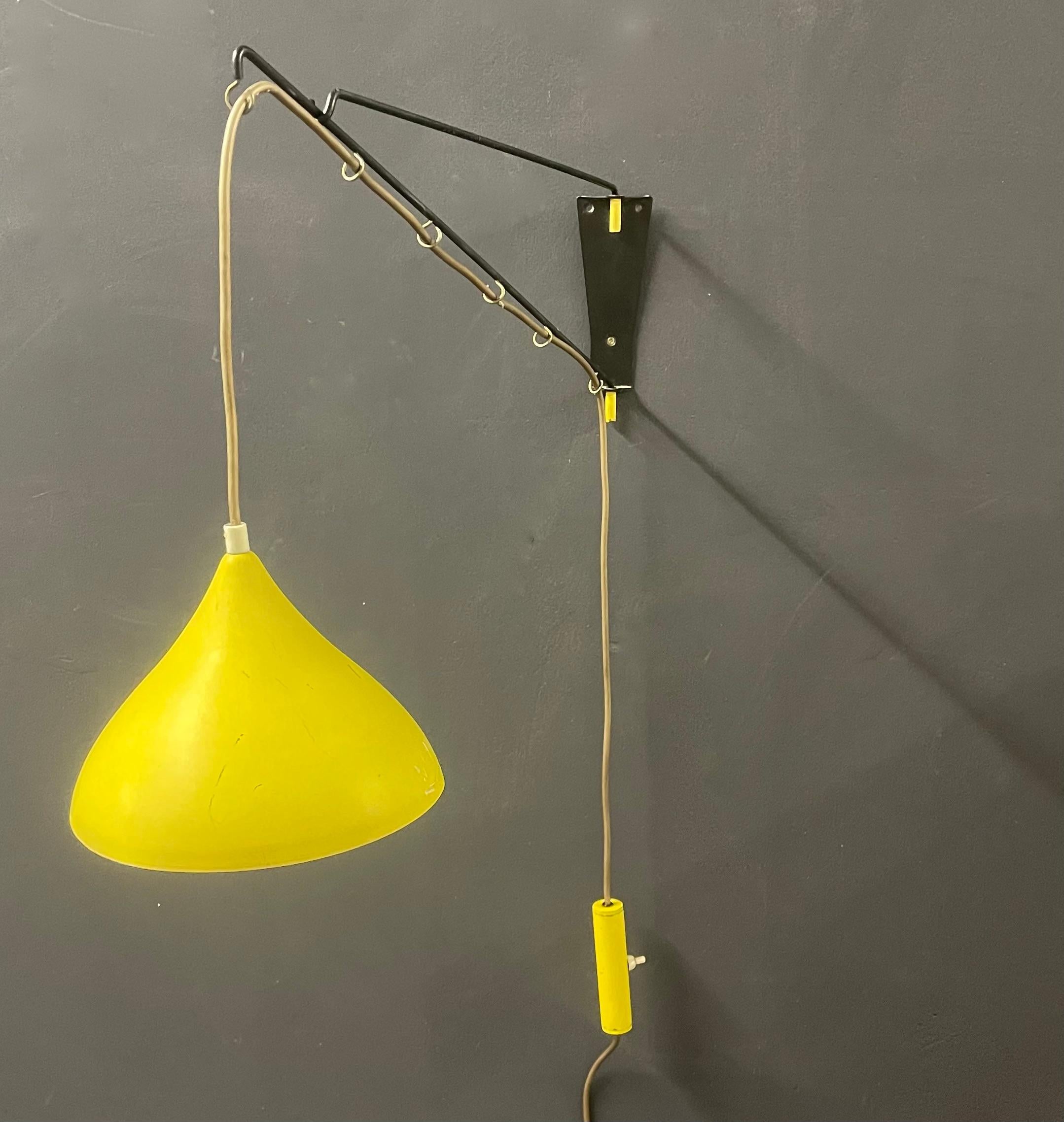 Wonderful cosack wall lamp with counter weight.