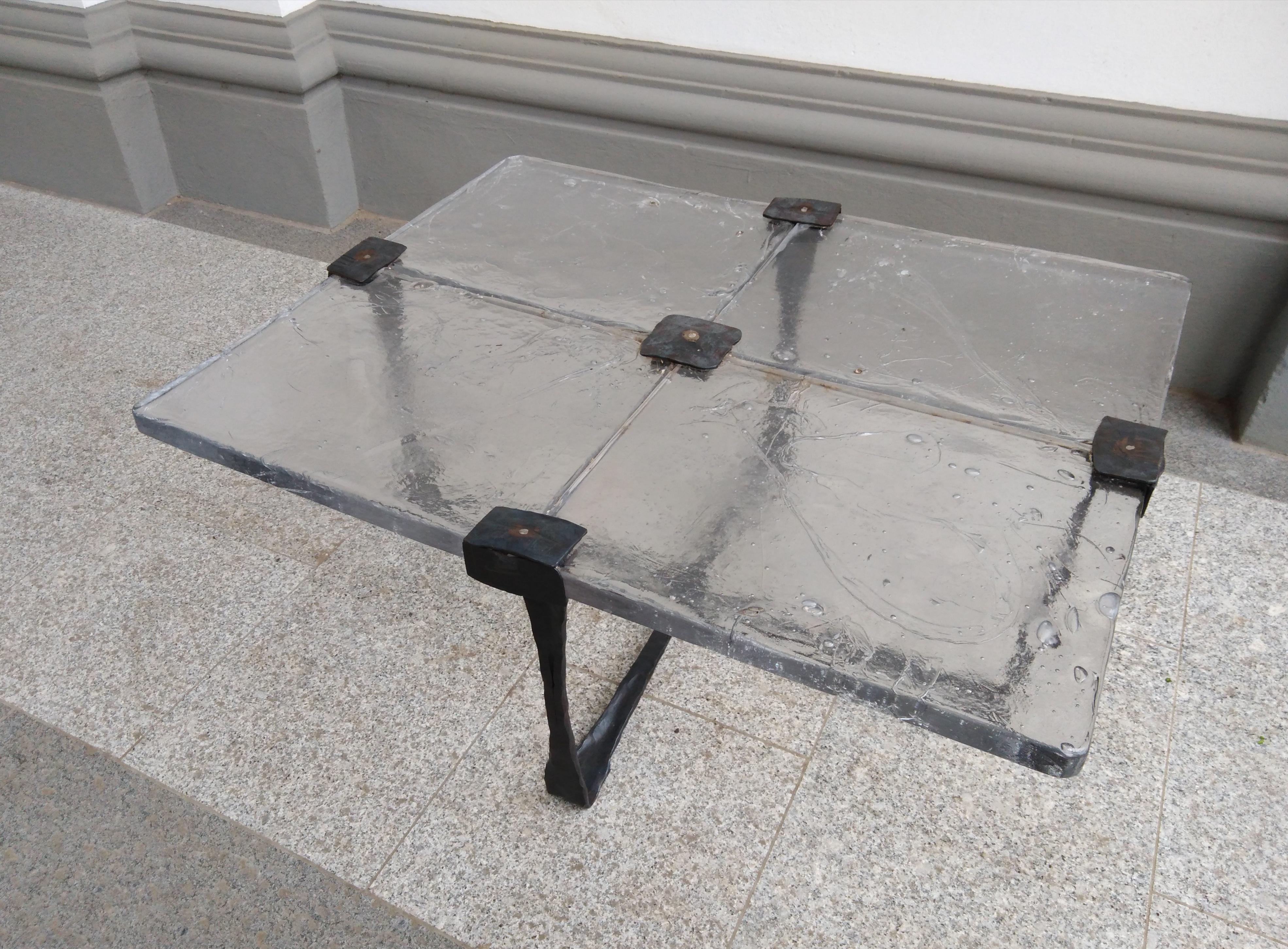 Rare couchtable in glass and metal by Lothar Klute from the 80s

We'll disamble the table for the transport : ) and will packed the glass pieces in seperate boxes.