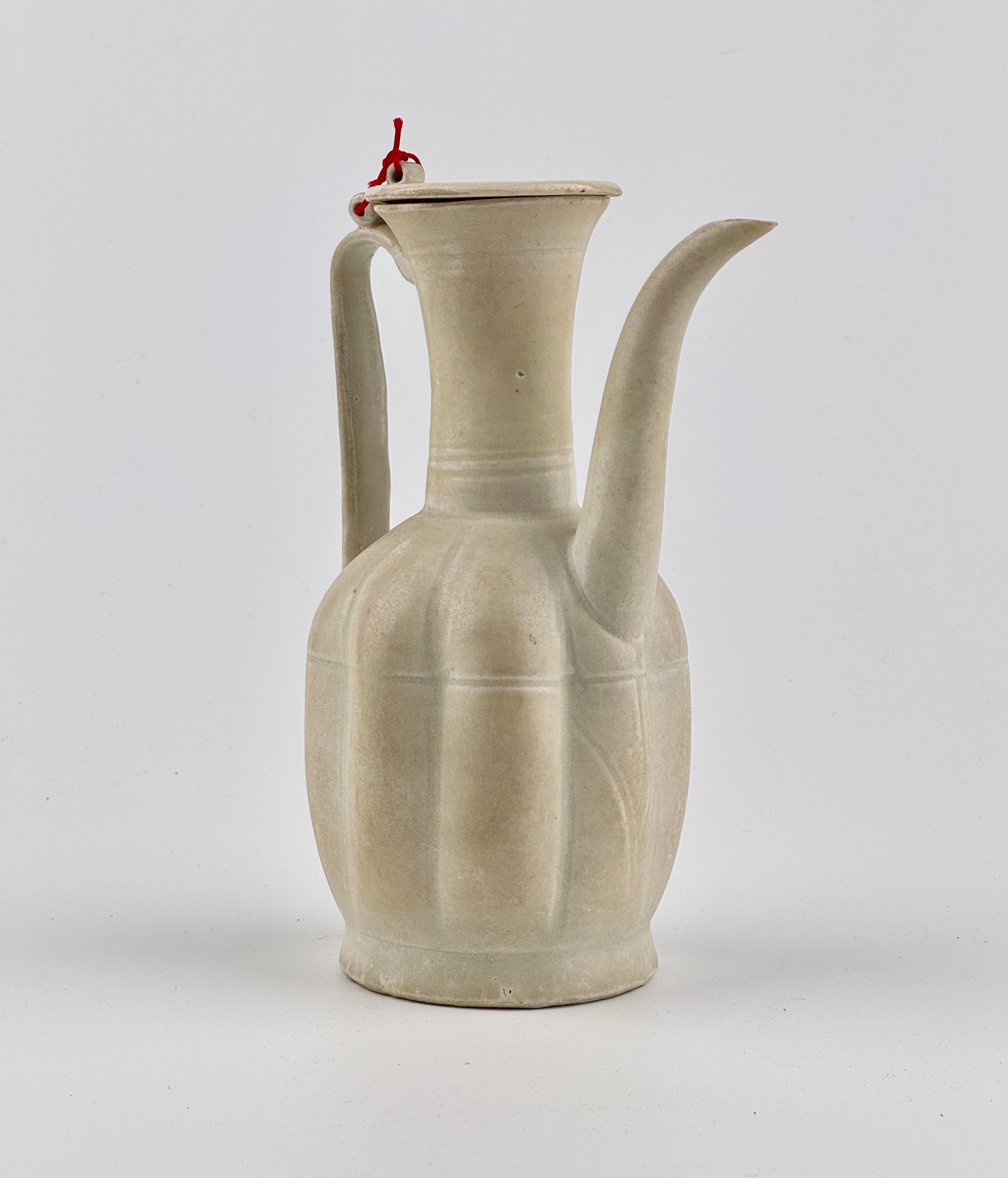 Hong Kong Rare Cream Glazed Ding yao Ewer and Cover, Song Dynasty (960~1279) For Sale