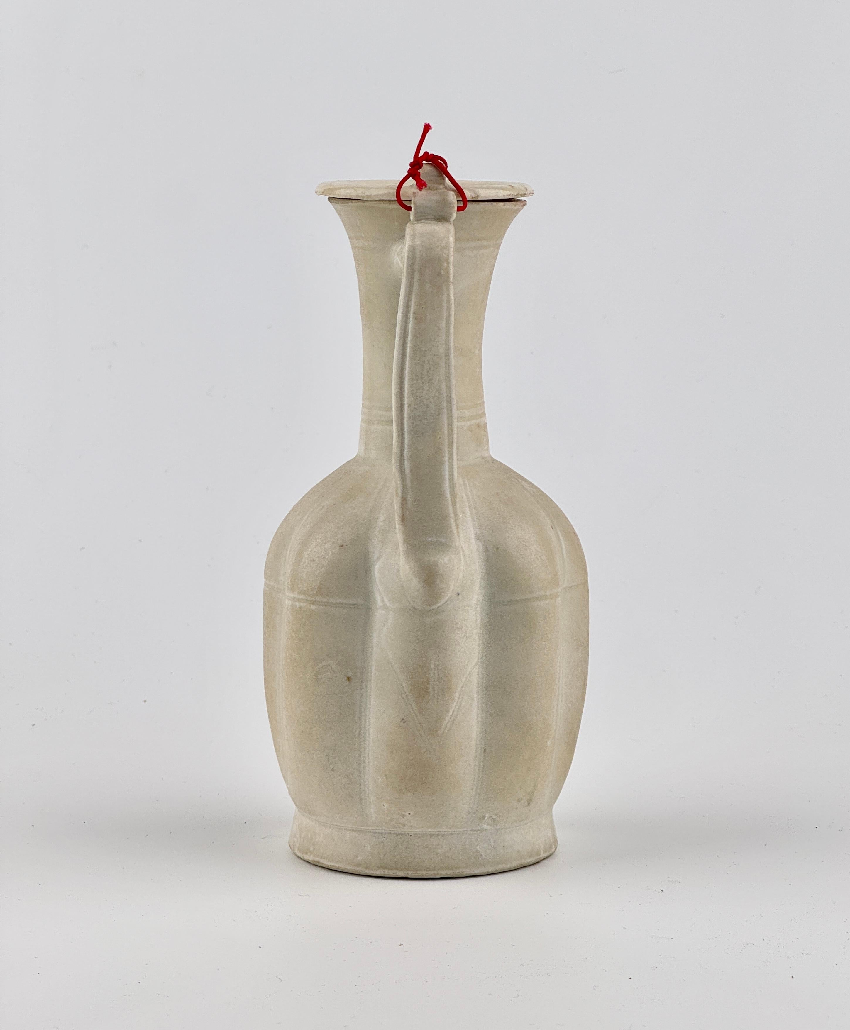 18th Century and Earlier Rare Cream Glazed Ding yao Ewer and Cover, Song Dynasty (960~1279) For Sale