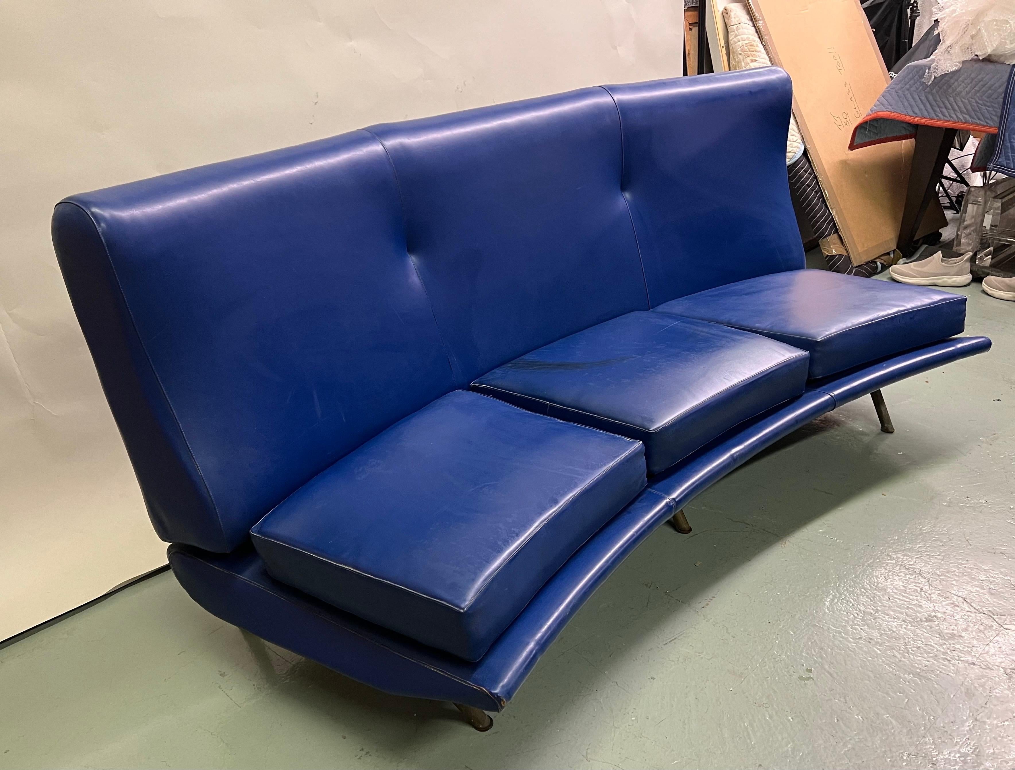 A Rare and Important Italian Mid-Century Modern Triennale Sofa / Divan/ Couch by Marco Zanuso for Arflex, Italy, circa 1951. The piece is in it's original Ultra-marine faux leather / vinyl upholstery and Features a rare, subtle, curved form and