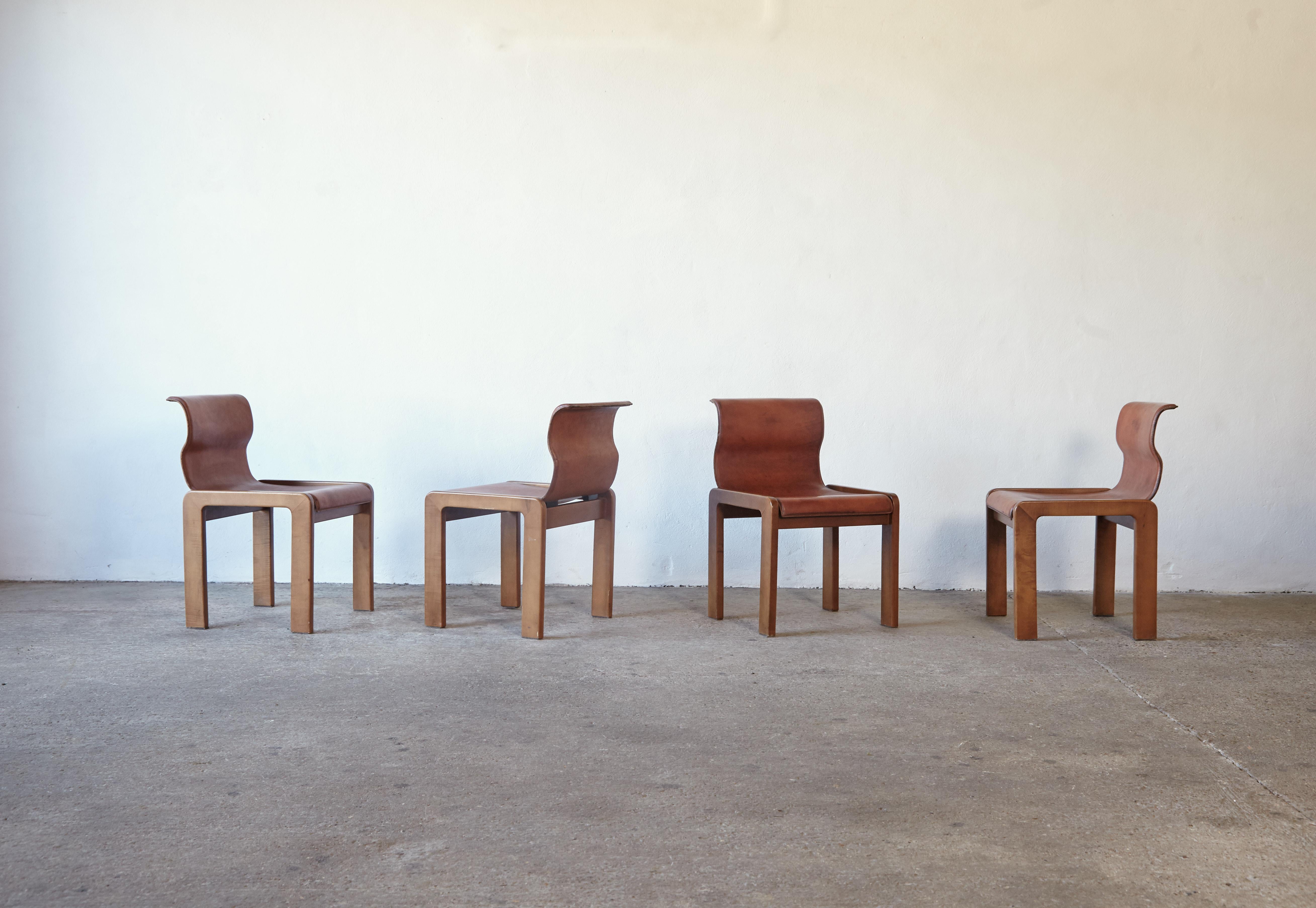 A rare set of four Afra & Tobia Scarpa style dining chairs, with wavy curved back of original patinated leather, Italy, 1960s70s. Fast shipping worldwide.




UK customers please note: displayed prices do not include VAT.






 