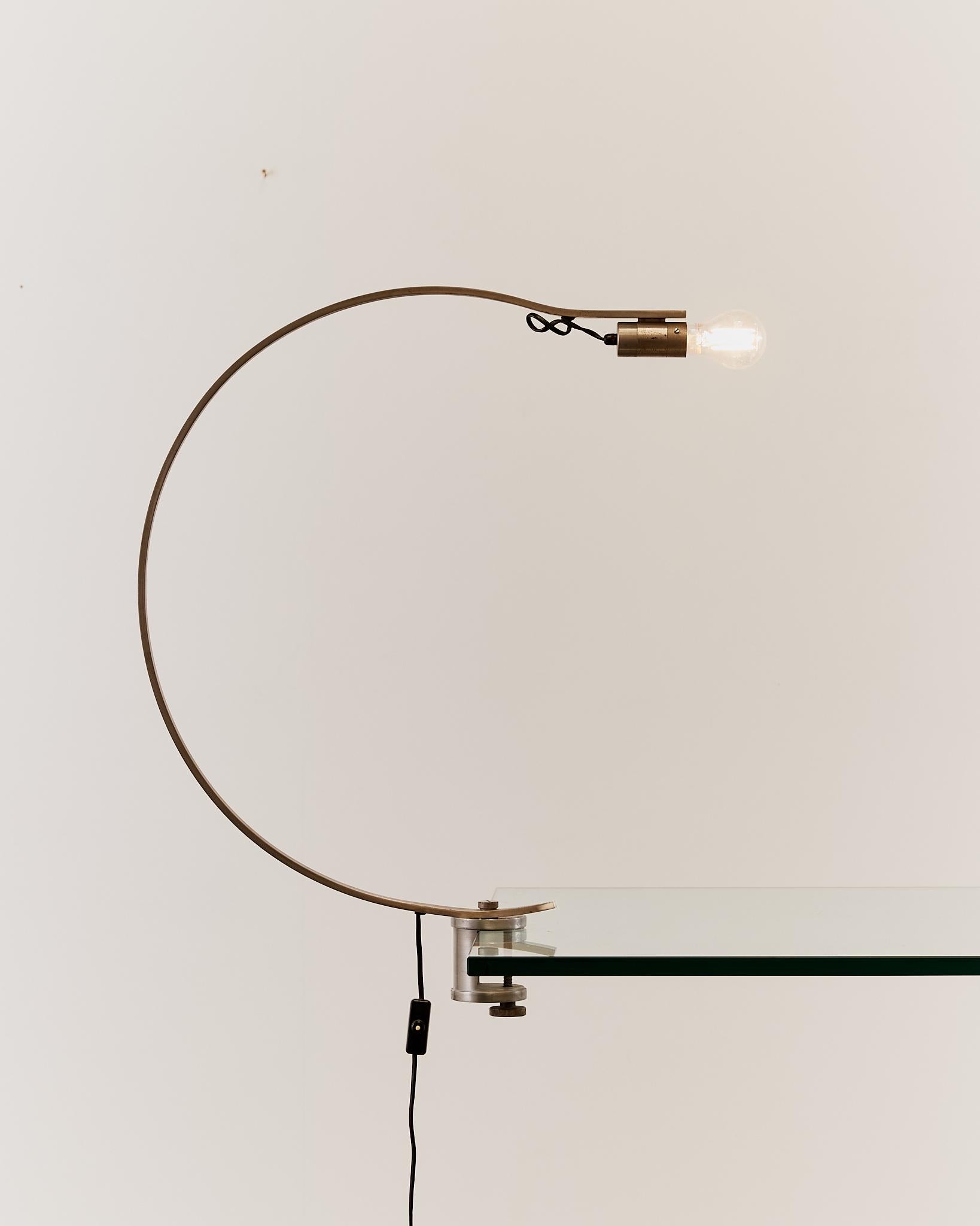 Rare curved 'Witch' lamp by Alonso Cagozzi for Philips with mechanical clamp 6