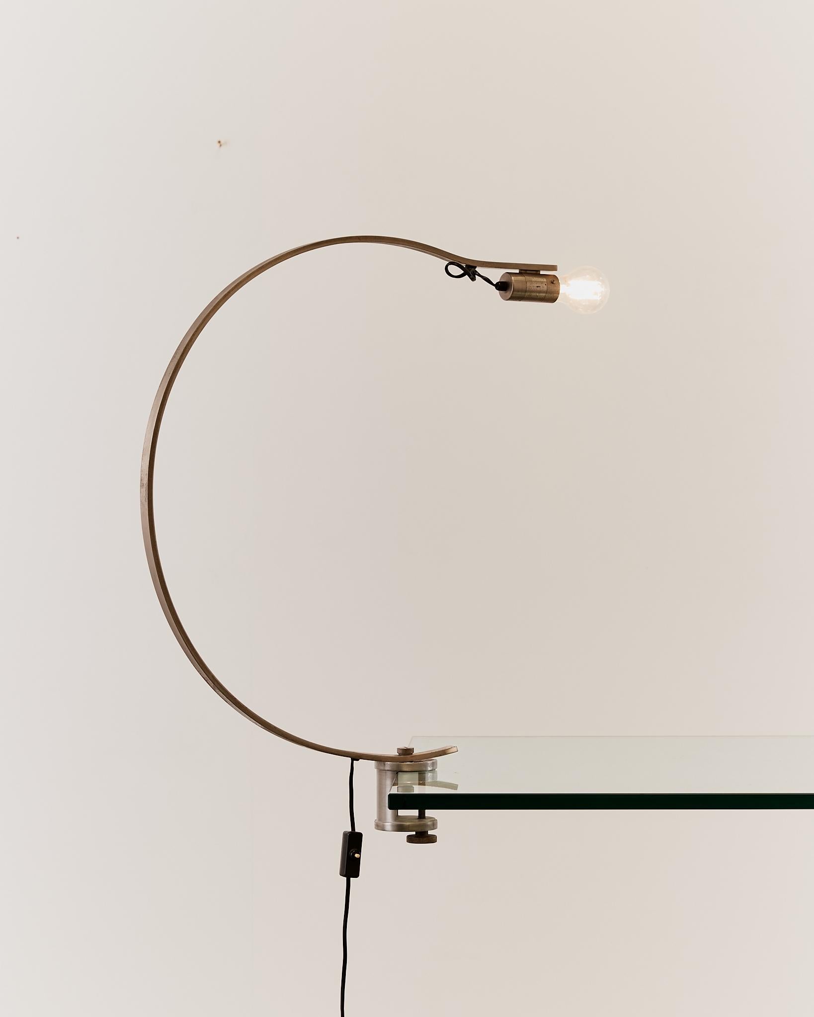Rare curved 'Witch' lamp by Alonso Cagozzi for Philips with mechanical clamp 7