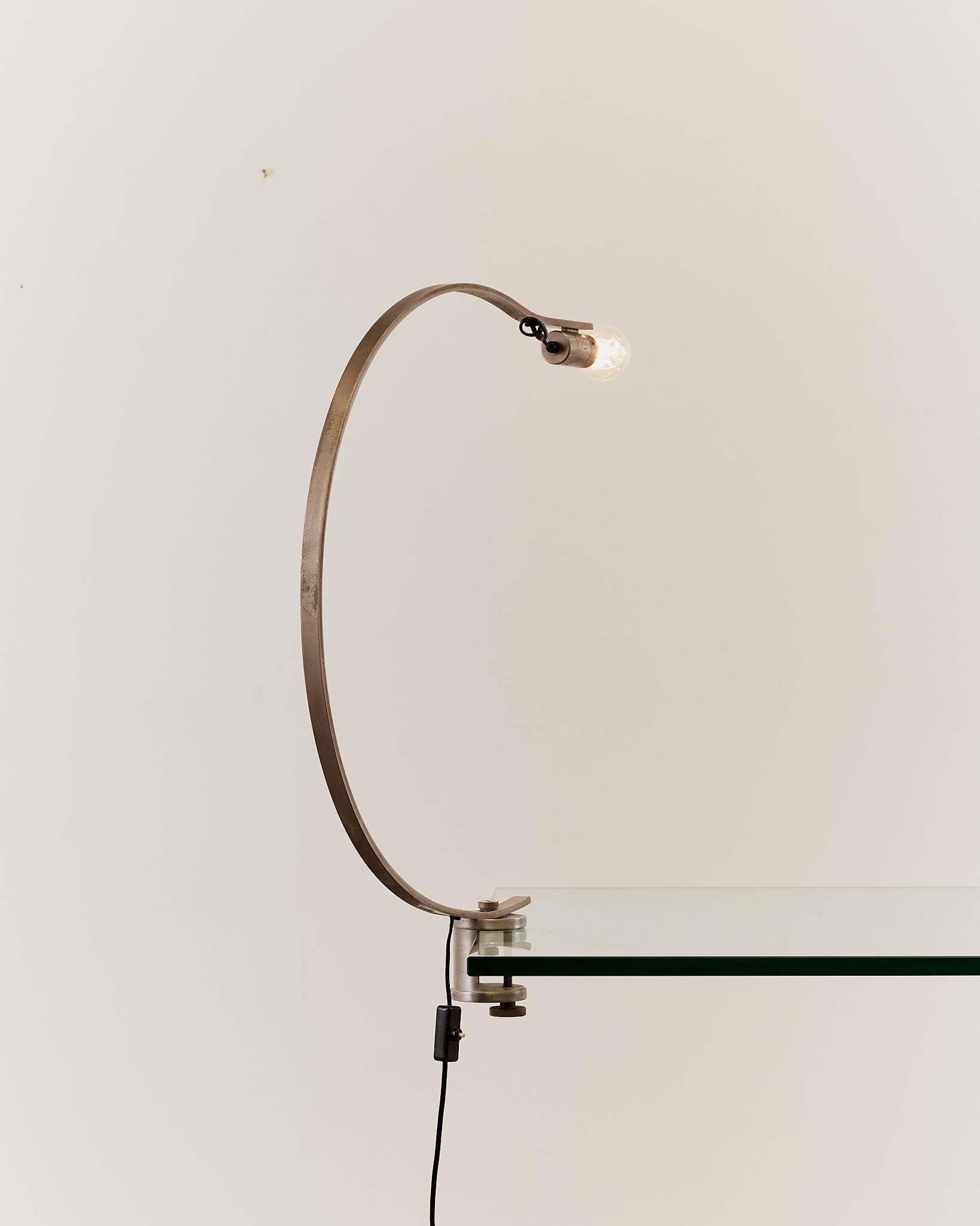 Rare curved 'Witch' lamp by Alonso Cagozzi for Philips with mechanical clamp 8