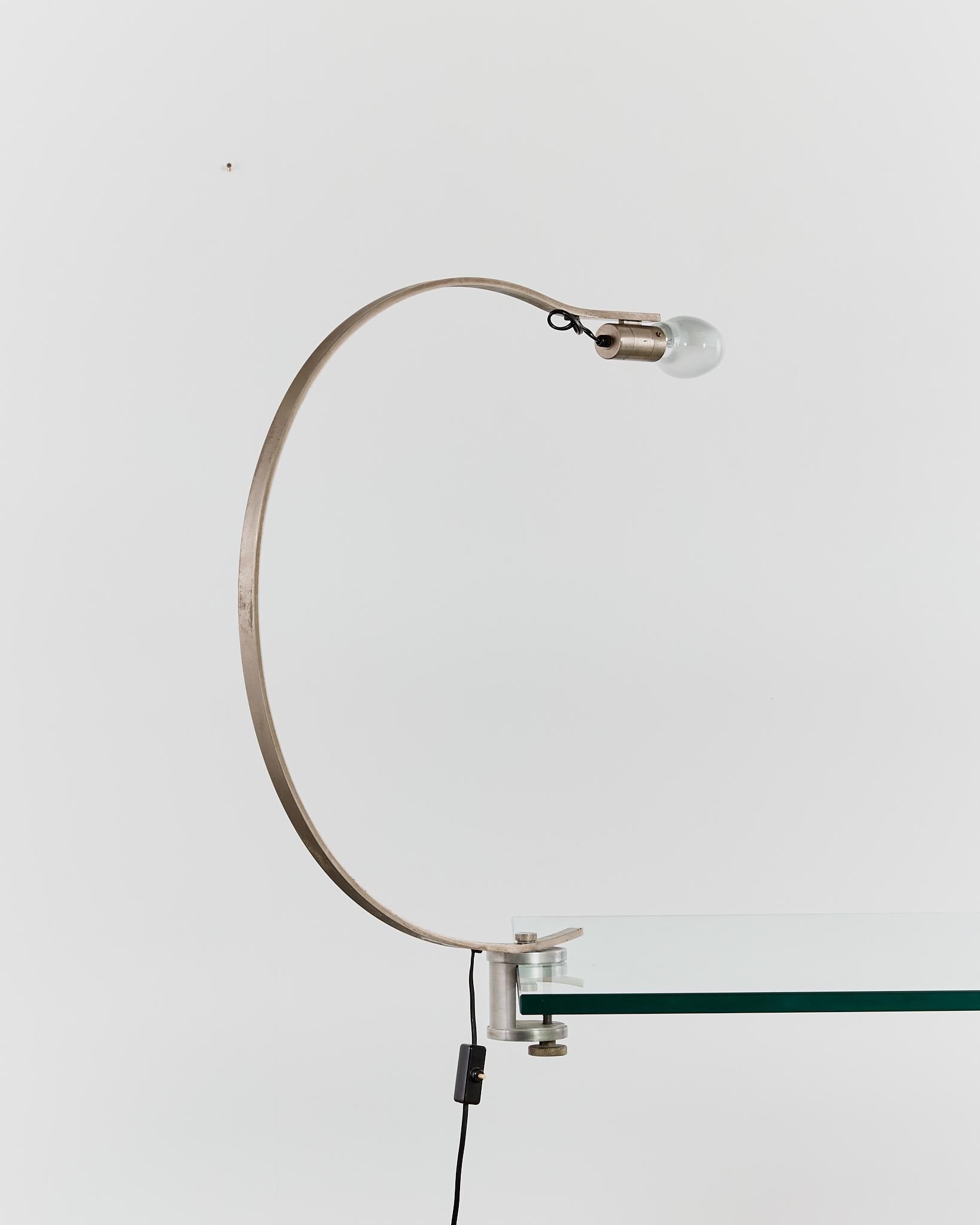 Post-Modern Rare curved 'Witch' lamp by Alonso Cagozzi for Philips with mechanical clamp