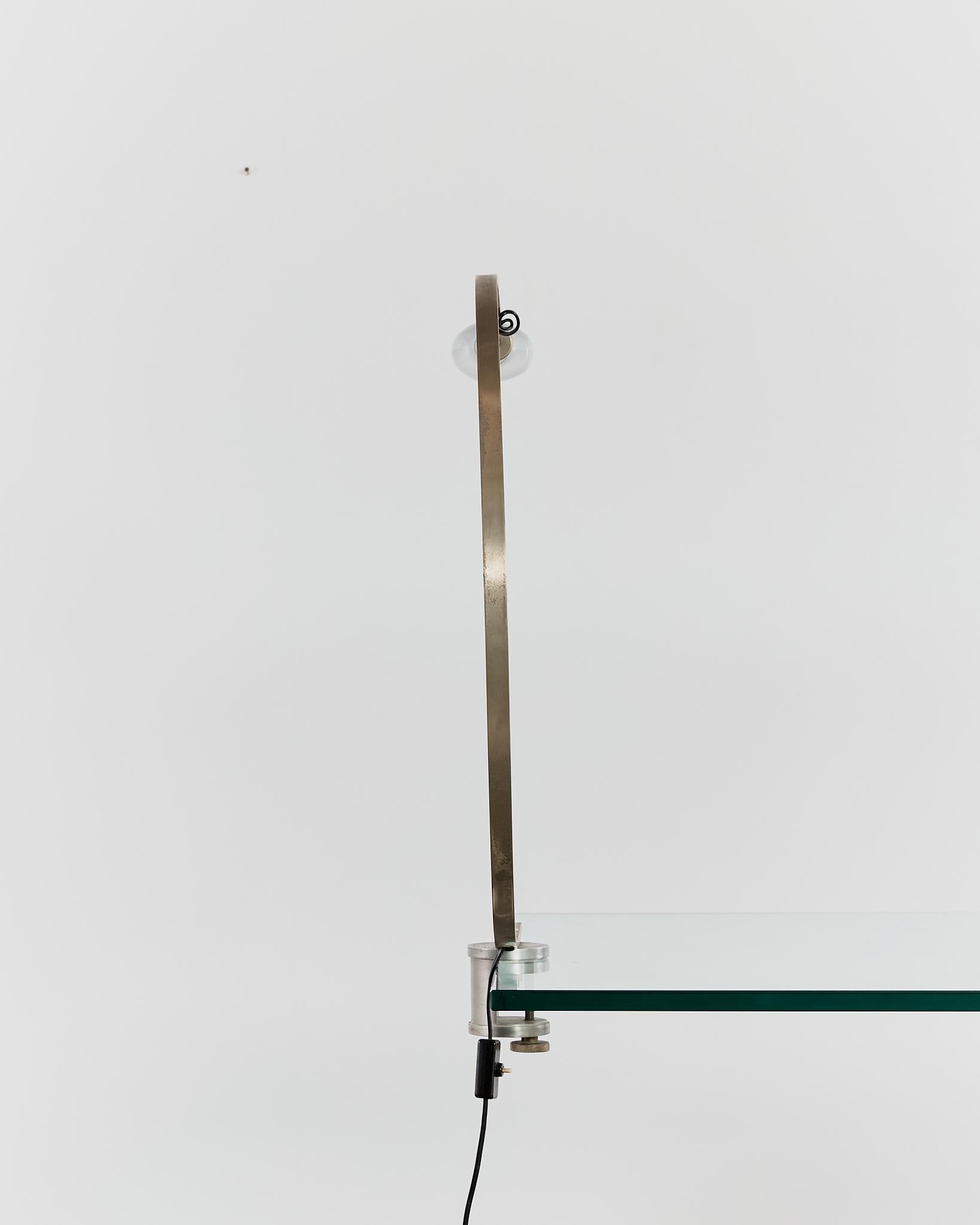 Italian Rare curved 'Witch' lamp by Alonso Cagozzi for Philips with mechanical clamp