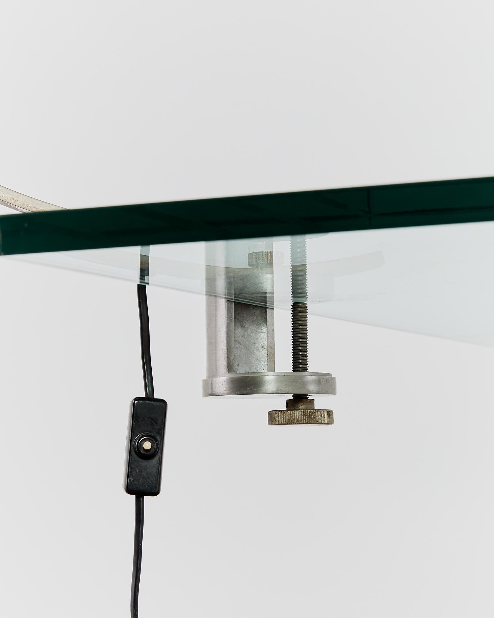 Rare curved 'Witch' lamp by Alonso Cagozzi for Philips with mechanical clamp 2