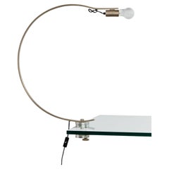 Rare curved 'Witch' lamp by Alonso Cagozzi for Philips with mechanical clamp