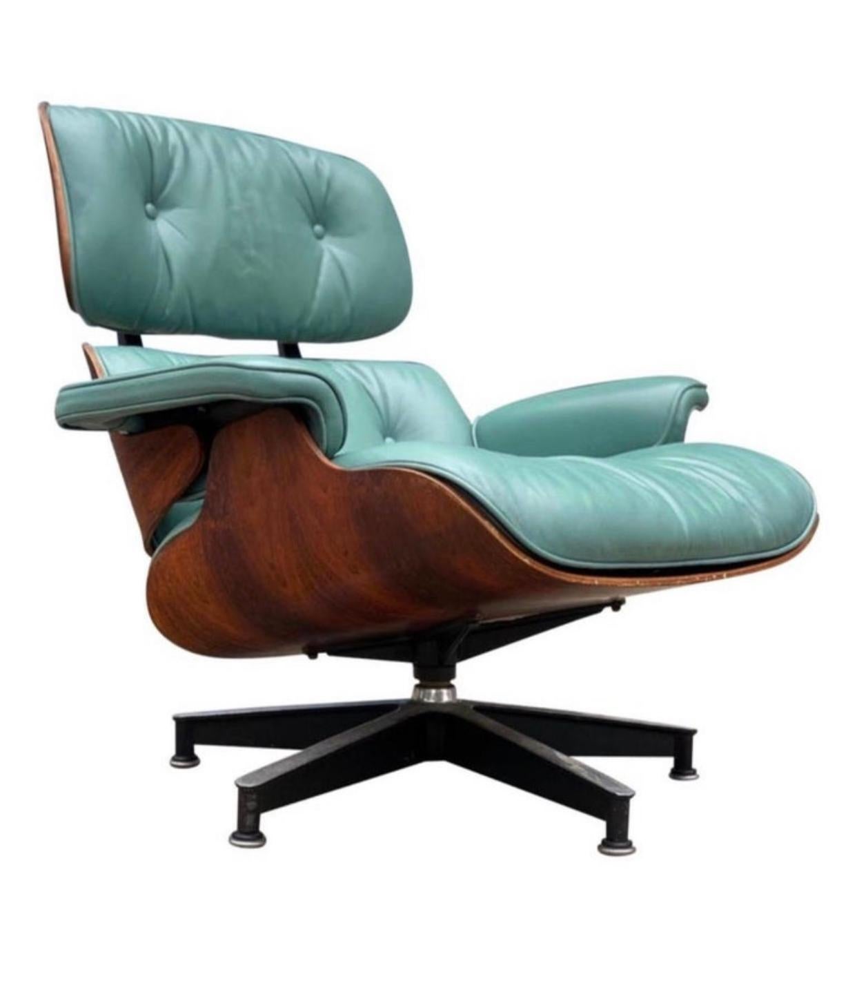 Incredibly vibrant and elegant edition of the Classic Herman Miller Eames lounge chair and ottoman with original Herman Miller label. Custom new leather cushions in superb condition. This shade is not a color we have ever come across before. All