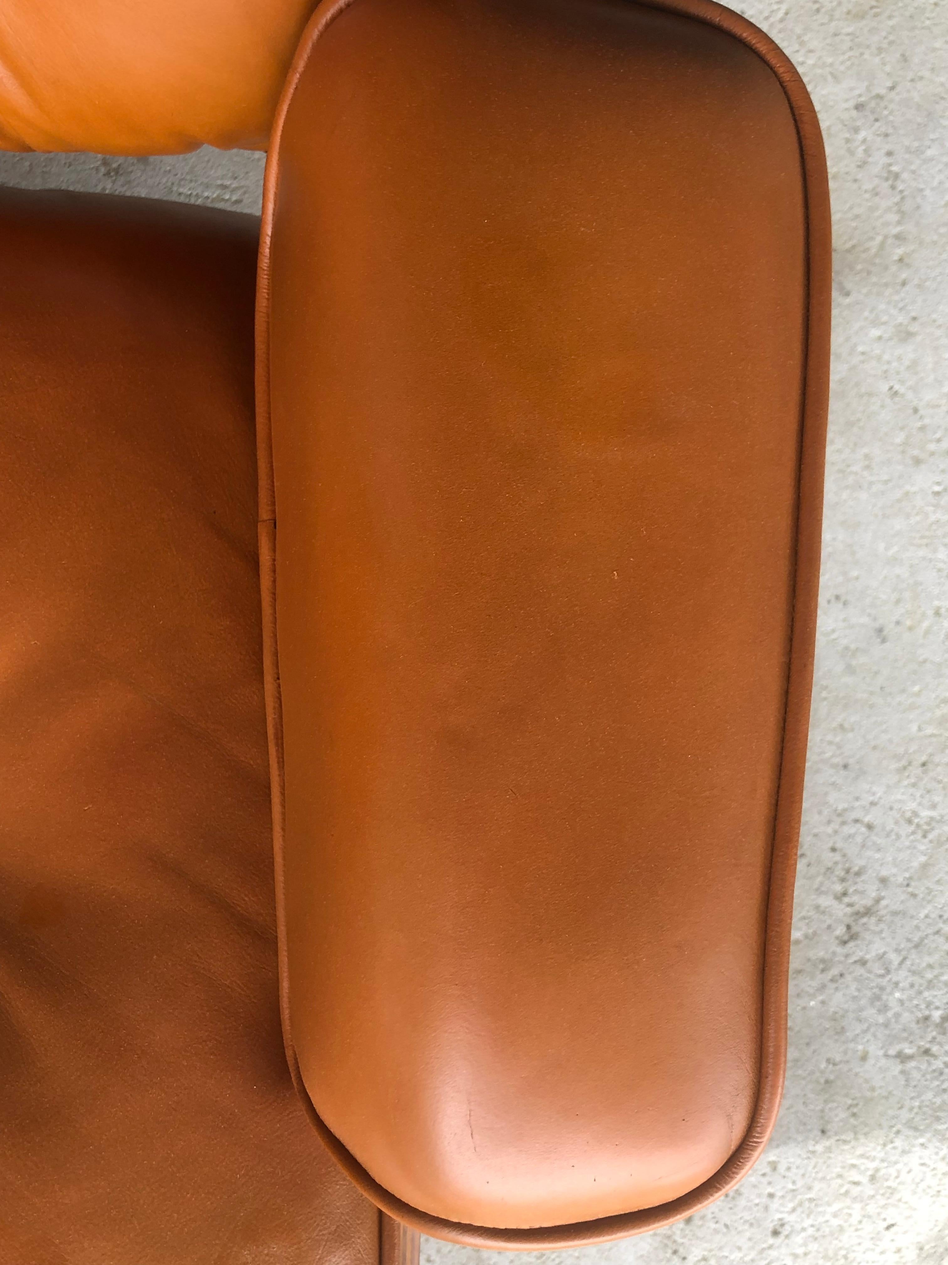 American Rare Custom Herman Miller Eames Lounge Chair and Ottoman in Burnt Orange