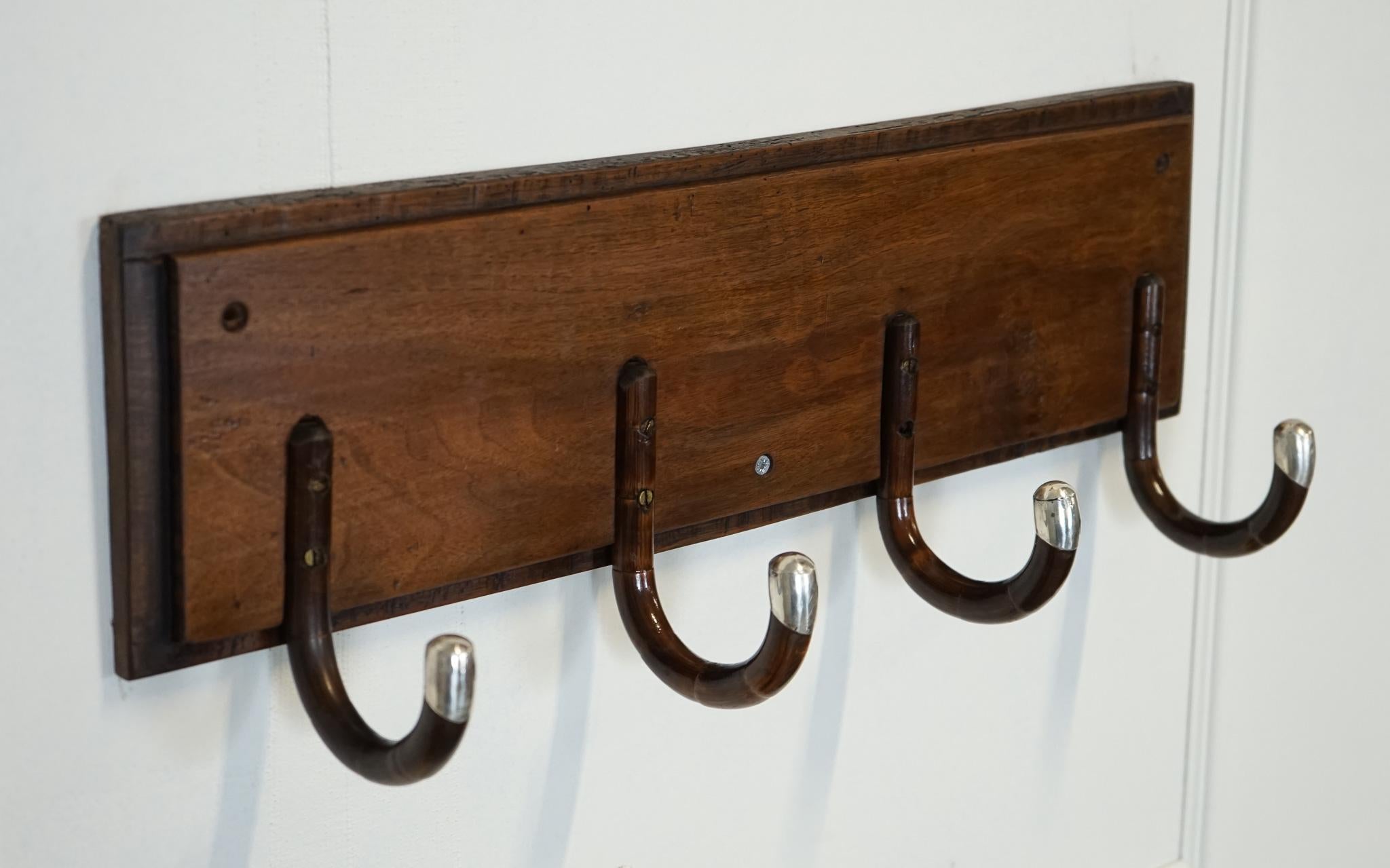 
We are delighted to offer for sale This rare custom-made Art Deco hat coat wall rack from the 1920s.

 A striking and highly collectible piece. It is made from four canes, adding to its unique and artisanal appeal. The wall rack was created in