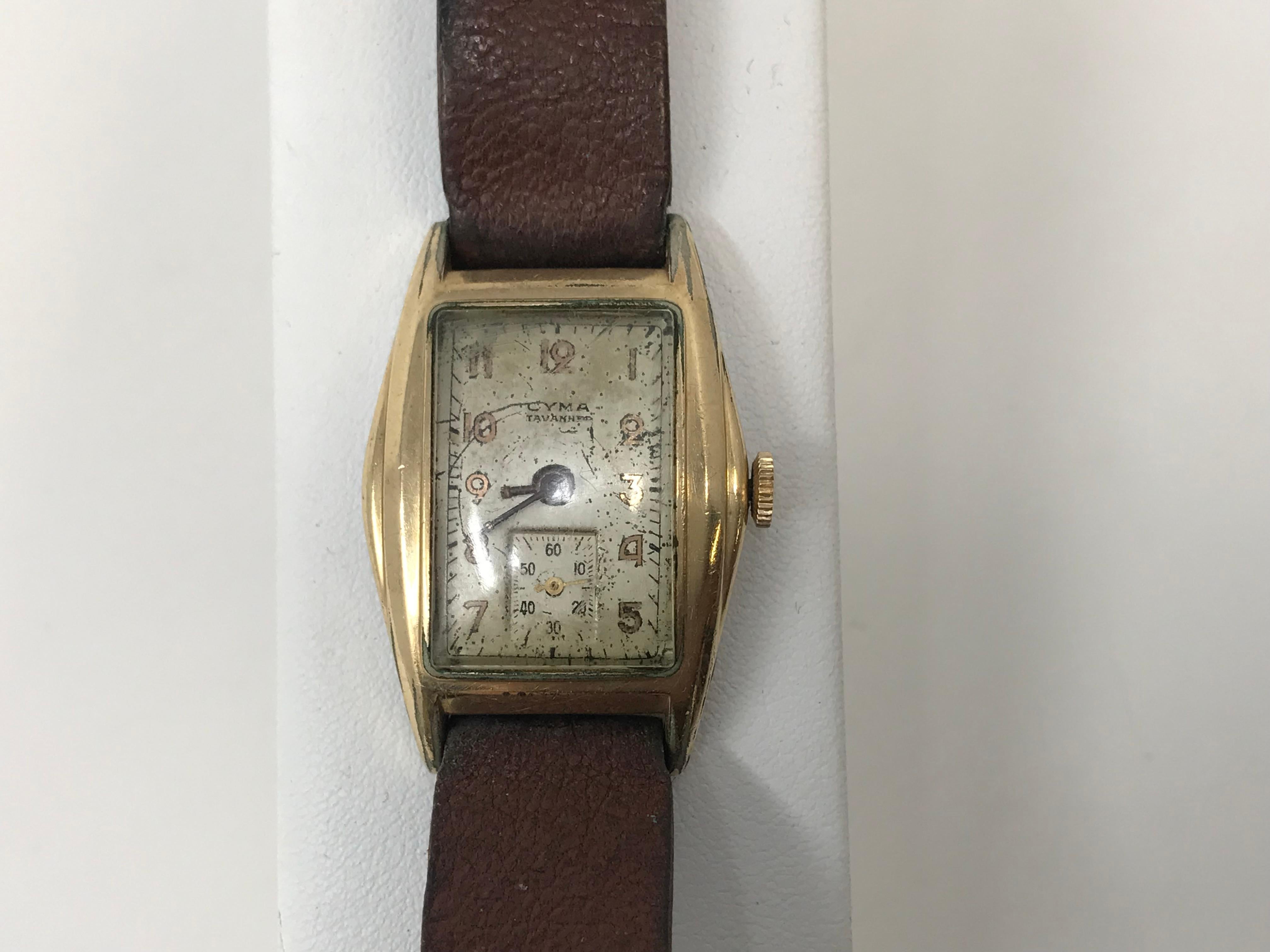 Rare Cyma Tavannes manual watch 17 jewels movement #176747, goldplated. Stainless steel case back with used leather strap. In good working order.