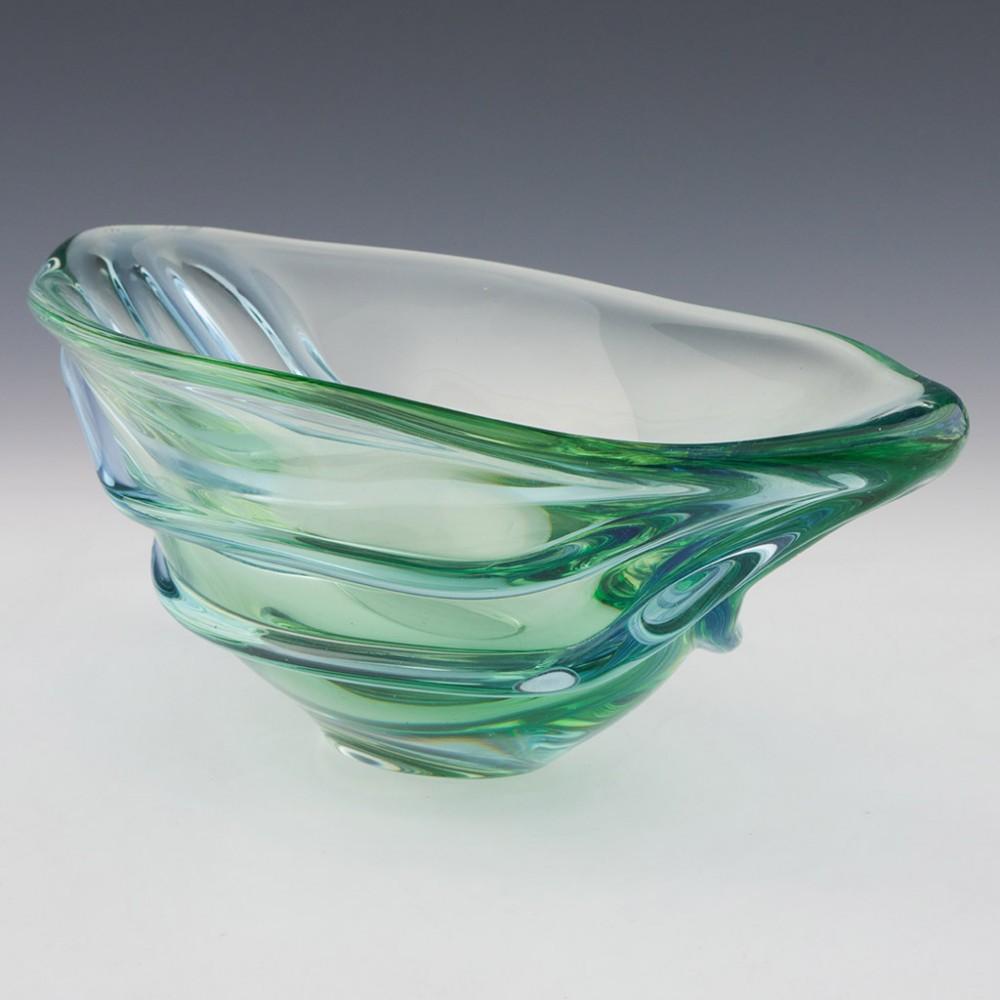 Rare Czech Harmony Bowl Designed by Frantisek Zemek, 1959

Additional information:
Date : Designed 1959
Origin : Mstisov, Czechoslovakia
Bowl Features : Greeny blue glass with ribbed sections to the sides. 
Marks : None 
Type : Lead
Size : L