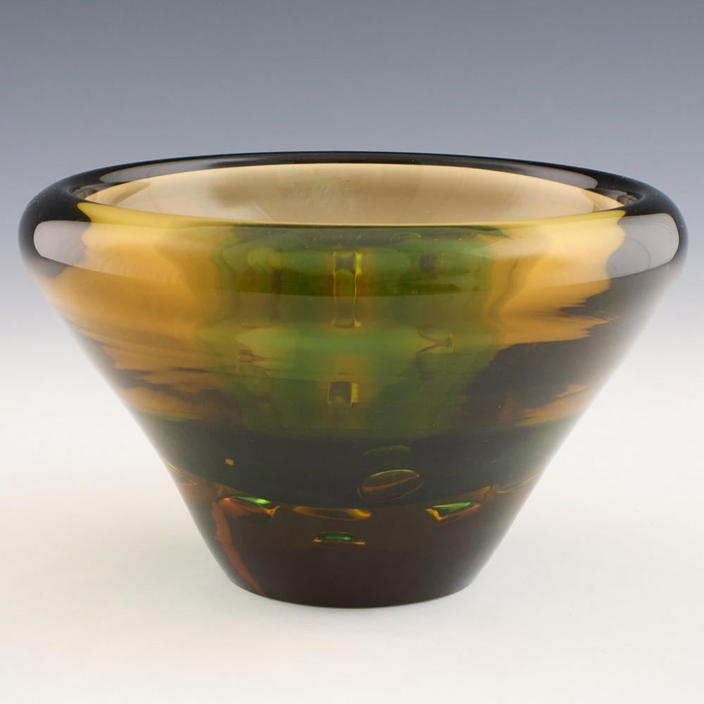 Heading : Rare Czech Skrdlovice 'Olympia' range bowl designed by Vladimir Jelinek
Date : Designed 1964 - this example is from the late 60s
Origin : Skrdlovice, Czechoslovakia (now Czech Republic)
Bowl Features : Thick amber and green glass with air