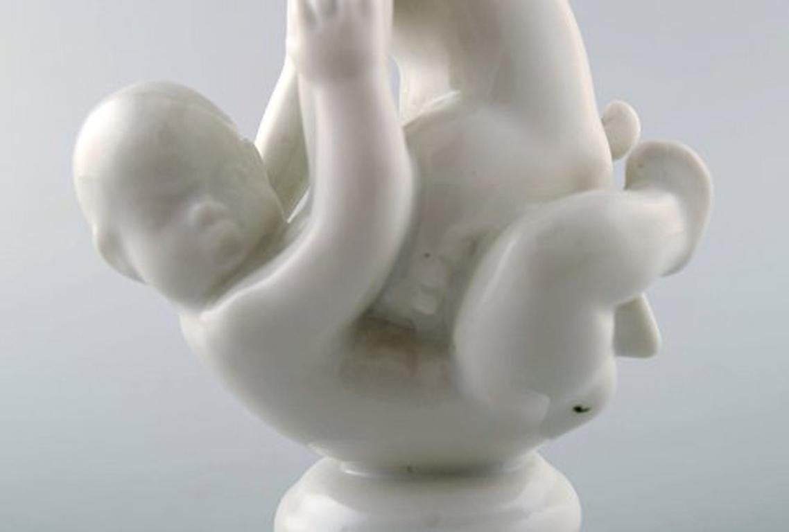 Rare Dahl Jensen Figure, Blanc de Chine, Faun Sitting on Baby 1
