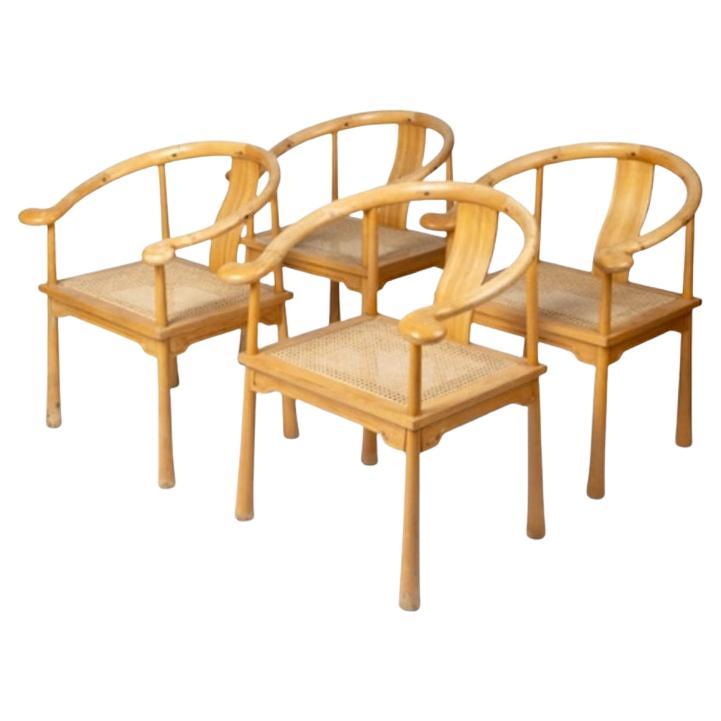 A set of four vintage dining chairs by Richard Nissen.

The 'Yin & Yang' chairs feature exceptional detailed joinery on the backrest and arms, they also have beautiful cane seats, showcasing the craftsmanship of their time.

Made from beech wood and